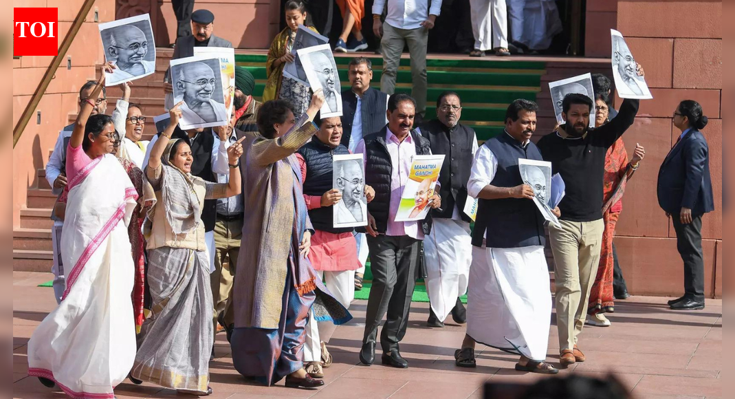 BJP MPs Nishikant Dubey and Sanjay Jaiswal have filed a “breach of privilege and contempt” notice against several opposition members. Source – ANI NEW DELHI: BJP MPs Nishikant Dubey and Sanjay Jaiswal have filed a “breach of privilege and contempt” notice against several opposition members and urged Speaker Om Birla for disciplinary action against them for “continuously obstructing” the House’s proceedings when rural development minister Shivraj Singh Chouhan was piloting the G RAM G Bill Official sources said Birla is examining the matter. The Speaker was critical of the excessive disruption by several MPs, some of whom reached the table of Lok Sabha officials in an attempt to disrupt proceedings, on Wednesday. Midnight Drama Over VB-G RAM G Bill, Opposition Stage Overnight Protest, Sleep Outside Parliament Dubey named Hibi Eden, Dean Kuriakose, S Murasoli, K Gopinath, Sashikant Senthil, Shafi Parambil, S Venkateshan and Jothimani, all from different opposition parties, in his notice.In his letter to Birla, he accused them of continuously obstructing the smooth functioning of the House by creating obstructions for Chouhan and the officers assisting the House.”As such, this is misconduct in the presence of House, disobedience to the authority of Speaker, obstructing officers of the House in discharge of their duties which is clearly a breach of privileges of Members of Parliament collectively and the contempt of the House,” he added.He urged Birla to take “strict action” against against the opposition MPs “so that in future this kind of incidents do not re-occur”.When Chouhan was responding to the debate, opposition members rushed to the Well of the House, tore copies of the Bill and stood on tables to register their protest against the provisions of the rural job guarantee Bill, which will replace the 20-year-old Mahatma Gandhi National Rural Employment Guarantee Act (MGNREGA).The Speaker’s office is also examining the opposition’s notice for removal from office of Madras high court Judge GS Swaminathan and also the complaint filed against a TMC MP for vaping inside Lok Sabha even as e-cigarette is banned across the country.As the session came to an end, Parliamentary Affairs Minister Kiren Rijiju lauded this sitting of Parliament as a milestone in PM Narendra Modi’s push for “reform express”, highlighting the passage of some key legislations covering rural employment, insurance and nuclear energy.He also blamed the opposition for the absence of discussion on air pollution in Delhi-NCA, claiming that the govt was keen for it but Congress wanted to continue with loud protest against the Viksit Bharat Guarantee for Rozgar and Ajeevika Mission (Gramin) (VB-G RAM G) Bill and persuaded other opposition parties as well.Rijiju, however, termed the session as “very productive” as eight bills were passed after debates in both Houses. These legislations will “speed up” the ‘reform express’ flagged off by Modi to bring improvement in the everyday life of the common people. The reform express will continue, he added.”But the opposition’s behaviour during the debate in Lok Sabha on Viksit Bharat Guarantee for Rozgar and Ajeevika Mission (Gramin) (VB-G RAM G) Bill was unacceptable. Some of the opposition members even stood atop the desks of the table office and (Lok Sabha) secretary general. Some Congress members also conveyed that there was no need for a debate on pollution. That is why the issue could not be taken up for discussion,” he said.In Lok Sabha, Birla noted that the House’s productivity topped 111% and was marked by a marathon discussion of over 11.30 hours to commemorate 150th anniversary of Vande Mataram. End of ArticleFollow Us On Social MediaVideosVaping, Bhow-Bhow & Shouting Match: A Look At Viral Moments Of Parl As Chaotic Winter Session EndsBondi Beach Terror Suspect Visited Hyderabad Six Times After Leaving India, Telangana Police Reveal’To Delay Elections, Instigate India’: Former Minister Blames Yunus Govt For Bangladesh ViolenceBangladesh Crisis: Tharoor Panel Red Flags 5 Reasons That Make It India’s Biggest Test Since 1971Rijiju Blames Congress As Parliament Session Ends Without Pollution Debate, Jairam Ramesh RespondsBangladesh: Hindu Man Lynching Sparks Outrage, Former Indian Envoy Calls Situation Total MobocracyExplained: Why Bangladesh’s Fresh Unrest Ahead Of Polls Is One Of India’s Biggest Strategic WorriesWho Was Sharif Osman Hadi, The Anti-India Face Of Bangladesh Whose Death Has Set Dhaka AblazePakistan Embarrassed Globally As Saudi Deports 56000 Beggars Despite No Fly Lists And Warnings’Countries Like Us Must Stick Together’: Jaishankar And Dutch FM On Strengthening India-EU Ties123PhotostoriesWeight loss Diet: How to make Mushroom Oats Omelette with just 1 tsp oil for breakfastCelebrity divorces and breakups in Bollywood in 2025: From Dhanashree Verma-Yuzvendra Chahal to Tamannaah Bhatia to Vijay Verma5 simple moves that keep kids active without calling it a workoutMerry Christmas 2025: The hidden science behind snowflakes and why no two are ever the sameBaby names inspired by female warriors of IndiaThe right way to add protein to your diet, according to ICMRAlia Bhatt, Ranveer Singh, Ayushmann Khurrana redefine method dressing7 Christmas delicacies you should warn off if you’re diabetic17 one-pot rice dishes for winter months5 gym mistakes that can put heart health at risk123Hot Picksvb g ram gICICI Prudential AMCUAE RainGold rate todaySilver rate todayPublic Holidays DecemberBank Holidays DecemberTop TrendingJosh Allen Luxury Car CollectionRandi MahomesAuston MatthewsWho is Nicole LundersJeremy Doku and Shireen Doku Net WorthRBSE Rajasthan Board Exam Time TableWalker Buehlers WifeSibley ScolesAssam Rajdani Express TragedyCristiano Ronaldo