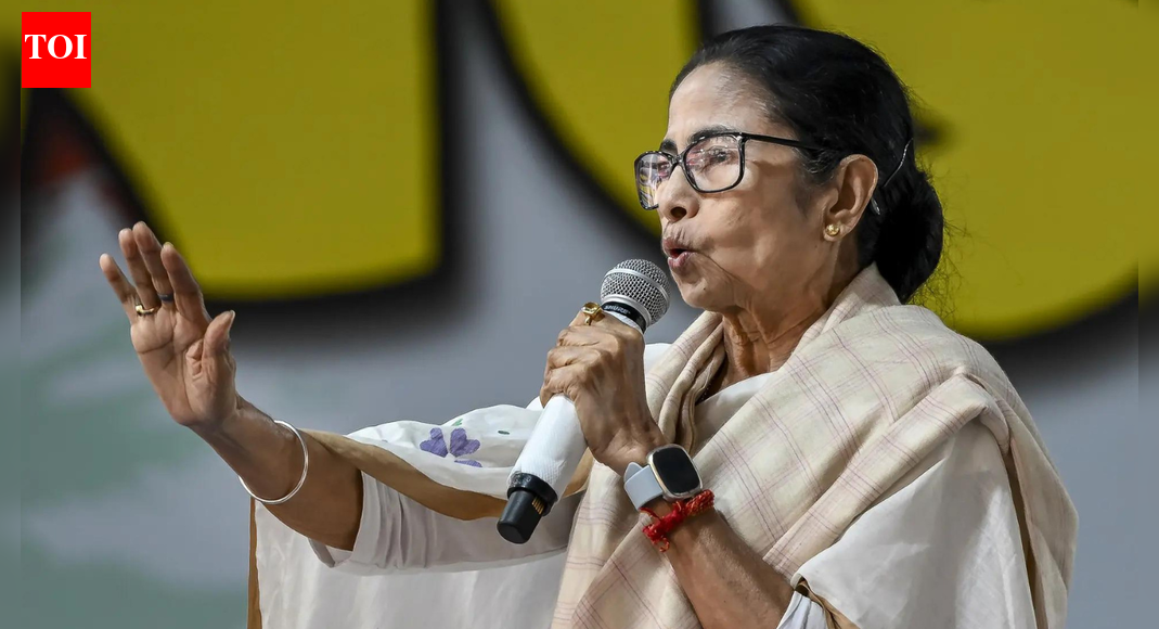 West Bengal CM Mamata Banerjee NEW DELHI: The West Bengal government on Saturday officially renamed its flagship 100-day employment scheme, ‘Karmashree’, to ‘Mahatmashree’ in honour of Mahatma Gandhi.The notification follows West Bengal chief minister Mamata Banerjee’s announcement two days earlier, amid the row over the central government renaming the Mahatma Gandhi National Rural Employment Guarantee Act (MGNREGA) to Viksit Bharat–Guarantee for Rozgar and Ajeevika Mission–Gramin (VB-G RAM G) Bill.Also Read | ‘We’ll give respect to Mahatma Gandhi’: Mamata to rename Bengal job scheme; slams Centre”The renaming not only preserves the legacy of Mahatma Gandhi but also aligns our state programme with the spirit of public welfare,” news agency PTI quoted a senior state official as saying.On Thursday, Banerjee, who also leads the state’s ruling TMC, announced at a business event in Kolkata that Karmashree would be given a new name. “We started the Karmashree scheme, but Gandhi ji’s name was not included. I’m really sorry, I’m ashamed. The father of the nation’s name should have been there, just like in the MGNREGA program. In the new bill, Gandhi ji’s name won’t be there,” Banerjee said.“So, Karmashree’s name will be changed to Mahatma ji’s scheme. If the Centre does not give respect to Mahatma ji, we will,” she added.Govt vs opposition on VB-G RAM GBoth Houses of Parliament passed the VB-G RAM G Bill on Thursday, the penultimate day of Parliament’s winter session, which began on December 1. VB-G RAM G to replace MGNREGA and guarantees 125 days of rural wage employment every year. MGNREGA was introduced by the erstwhile Congress-led UPA government at the Centre in 2005.Also Read | ‘Attack on poor’: Sonia Gandhi slams PM Modi over VB-G RAM G Bill; criticises repealing of MGNREGAThe national opposition, including the TMC, had demanded that the VB-G RAM G Bill be sent to a parliamentary committee for scrutiny, citing the “financial burden” it would place on states, and criticised the BJP-led Centre for removing Mahatma Gandhi’s name from the rural employment guarantee scheme.The Union government, however, maintains that the new legislation is a “substantial improvement” over MGNREGA, which it described as “riddled with corruption and inefficiency.”About the AuthorTOI News DeskThe TOI News Desk comprises a dedicated and tireless team of journalists who operate around the clock to deliver the most current and comprehensive news and updates to the readers of The Times of India worldwide. With an unwavering commitment to excellence in journalism, our team is at the forefront of gathering, verifying, and presenting breaking news, in-depth analysis, and insightful reports on a wide range of topics. The TOI News Desk is your trusted source for staying informed and connected to the ever-evolving global landscape, ensuring that our readers are equipped with the latest developments that matter most.”Read MoreEnd of ArticleFollow Us On Social MediaVideosHindu Lynching Sparks Outrage: Shashi Tharoor Warns On Mob Rule, Priyanka Blasts Modi Govt SilenceEx-PM Imran Khan And Bushra Bibi Jailed For 17 Years In Toshakhana Gift Jewellery Case’There Is Only One Modi’: Jaishankar Says Leaders Define Nations, Not Ministers Or IndividualsMore Complicated Than Ever: Jaishankar Flags US, China, Russia, Europe As India Faces Harder ChoicesPM Modi Says BJP Correcting Congress Mistakes As Assam Gets New Airport And Northeast PushKabul Chooses India For Medicines As Afghan Minister Admits Pakistan Ties Have Deteriorated BadlySonia Gandhi Criticises PM Modi Over VB-G RAM G Bill And MGNREGA Rollback’Maha Jungle Raj in Bengal, Mamata Shielding Infiltrators’: PM Modi Blasts TMC in Virtual RallyPiyush Goyal Says Congress Policies Suppressed Enterprise And Capped India’s Growth For Decades’Global Order Has Changed Forever, No Single Nation Can Dominate All Issues’: Says EAM Jaishankar123Photostories10 best destinations near Delhi/NCR to plan your last-minute New Year getawayFrom Sunil Grover to Rupali Ganguly: This is what your favorite TV actors did before getting limelightBlurred vision or eye strain? These signs mean you need an eye check-up12 food combinations that can slow down parents’ agingWinter Snack: How to make Dhokla in a pressure cooker8 Stoic life lessons from “Meditations” by Marcus AureliusNot just cold or cough: Doctor shares common triggers that can cause a sore throatDipika Kakar’s PET scan comes back normal; Shoaib Ibrahim purchases a swanky new carStruggling With Sleep? Mantra For Your Date Of BirthMumbai vs Navi Mumbai airport: How India’s most congested airport is getting a much-needed breather123Hot PicksTom BradyEpstein files releasedTim SaunderGold rate todaySilver rate todayPublic Holidays DecemberBank Holidays DecemberTop TrendingJosh Allen Luxury Car CollectionRandi MahomesAuston MatthewsWho is Nicole LundersJeremy Doku and Shireen Doku Net WorthRBSE Rajasthan Board Exam Time TableWalker Buehlers WifeSibley ScolesAssam Rajdani Express TragedyUS Strikes