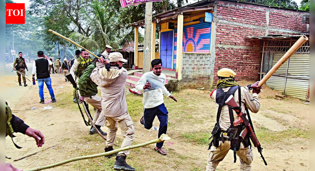 . GUWAHATI: Violent tribal protests against illegal non-tribal settlement in a constitutionally protected hill region of Assam left two people dead Tuesday – as Sixth Schedule protections and land rights ignited a volatile fault line. Assam DGP Harmeet Singh, IGP (law and order) Akhilesh Kumar Singh and 48 police personnel were wounded after crowds armed with bows, arrows, crude bombs and stones attacked security forces in West Karbi Anglong, a hill district bordering Meghalaya.Police said one tribal protester died in police action, while a non-tribal man died in a fire that gutted shops at Kheroni, a small trading town that has emerged as the epicentre of unrest. By evening, administration suspended mobile internet services indefinitely in West Karbi Anglong and adjoining Karbi Anglong district to prevent escalation. Voice calls and fixed-line broadband remained operational.The two districts are governed by Karbi Anglong Autonomous Council (KAAC) under Sixth Schedule of the Constitution, which grants tribal regions autonomy over land, forests and local governance to protect indigenous communities. Residents have for over a year protested encroachment by non-tribal settlers on professional grazing reserve (PGR) and village grazing reserve (VGR) lands, demanding evictions.Tensions sharpened after members of Karbi community began a hunger strike on Dec 6. On Tuesday, clashes intensified after police shifted some fasting protesters to Gauhati Medical College and Hospital following health deterioration – a move agitators allegedly misunderstood.State cabinet minister Ranoj Pegu, who met protesters earlier at Kheroni, said the group agreed to call off the hunger strike and join tripartite talks on Dec 26 involving state govt and KAAC. “We assured the Karbi community that the govt is serious about land rights and other tribal issues,” Pegu said, adding that discussions would address “broader issues related to existence of Karbi community”.Despite the talks, shops and markets in Kheroni were set ablaze during the day. Police said an SIT was formed, videos were being examined and efforts were under way to trace the attackers.DGP Harmeet Singh, who was present on the ground along with the IGP, described a coordinated assault. “It was a proper attack by protestors. I was attacked with bows and arrows, which had to be blocked with shields. I was also hit by stones,” he said.Singh said protesters used gas cylinders to torch markets, hurling one at security forces. “Govt is ready to talk. Violence does not achieve anything. We have all the videos and faces. Legal action will follow,” he said, appealing to communities to restrain youths he said were “misguided and being misused”.Assam Chief minister Himanta Biswa Sarma posted on X (formerly Twitter) that he was monitoring the situation and announced deployment of additional forces in Kheroni, located about 250km east of Guwahati. “It is deeply painful that two persons lost their lives during today’s unrest,” he wrote, offering condolences and assuring support for affected families.End of ArticleFollow Us On Social MediaVideosDelhi HC Grants Bail To Kuldeep Sengar; Victim’s Sister Says ‘Put Us In Jail To Keep Us Safe’India Summons Bangladesh High Commissioner Over Violence Against Hindus, Protests Continue”No Cases Filed”: Prachy Accuses Yunus Administration Of Protecting Convicted TerroristsExperts Warn India As Yunus Loses Control In Bangladesh After Hadi Killing Sparks Unrest NationwidePAN-Aadhaar Deadline Nears: How To Link Before December 31 Or Risk Inoperative PAN From Next Year“Neither Janmat Nor Janpath”: Bjp Alleges Growing Rebellion Against Rahul Gandhi Within CongressPak PM Sharif’s Party Leader Threatens India, Warns Missiles Will Respond If Bangladesh Is TargetedIndia’s BrahMos Missile Goes Global As India Closes 0m Defence Pacts With Vietnam And Indonesia’Make Her PM & See…’: Congress MP Endorses Priyanka Gandhi; BJP Takes ‘No Faith In Rahul’ DigHanuman Chalisa Verse Echoes In Delhi As Hindu Lynching In Bangladesh Triggers High Voltage Protests123PhotostoriesFrom Rajat Bedi to Akshaye Khanna: Best Bollywood comebacks of 202510 local Indian Christmas delicacies that are a must try5 latest bridal nath designs to elevate your traditional Indian wedding lookCosmic Fungi explained: The strange radiation-eating organisms found at Chernobyl8 classic Chicken Soups to keep you warm this winterMerry Christmas 2025: 10 famous classic Christmas dishes from around the worldAryan Khan with ‘The Ba***ds of Bollywood’; Tisca Chopra with ‘Saali Mohabbat’: Meet the debut directors of 2025From taking her first steps post delivery to updating fans on Kaju’s health and Laughter Chefs shoot, Bharti Singh shares an emotional hospital vlog7 common healthy-looking foods that are secretly causing inflammationInfrastructure Push Ahead as PMC Eyes Rs 200 Cr from Merged Zone123Hot PicksUAE WeatherPAN-Aadhaar linkingGold price predictionGold rate todaySilver rate todayPublic Holidays DecemberBank Holidays DecemberTop TrendingDwyane Wade WifeKai Cenat Mental HealthGeorge Kittle InjuryGiannis AntetokounmpoJack EichelCraig BerubePaul Heyman and Marla Heyman Net WorthDK MetcalfJade Cargill and Brandon Net WorthMax Holloway Net Worth