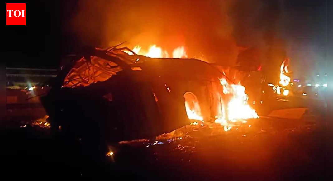The crash happened around 2am on Bengaluru–Pune national highway CHITRADURGA: A night journey turned into an inferno on a Karnataka highway early Thursday after a sleeper coach bus carrying 31 passengers was smashed by a container truck, killing six people, including a five-year-old girl, and leaving 28 with burn injuries.Among those killed were Bindu Darshan, 29, and her daughter Greya, 5, from Girinagar area of south Bengaluru, and software professionals HC Manasa, 27, AM Navya, 26, and Rashmi R Mahale, 24. Truck driver Kuldeep, 29, was found burned to death inside the cabin.When fire personnel extinguished the bus blaze, they found Greya had died hugging her mother. Bus driver Mohammed Rafiq was hospitalised with injuries, while cleaner Sadiq was thrown out of the vehicle. “Fellow motorists pulled out a few passengers from the burning bus,” police said.The crash happened around 2 am on Bengaluru-Pune national highway near Hiriyur town in Chitradurga district of central Karnataka, 170km northwest of Bengaluru. The bus operated by Seabird Travels was heading from Bengaluru to Gokarna, a beach town on the state’s coast in Uttara Kannada district.Police said the Haryana-registered truck travelling in the opposite direction jumped the road divider and ploughed into the right side of the bus, triggering a fire that quickly engulfed lower berths and trapped sleeping passengers.IG (eastern range) BR Ravikanthe Gowda said preliminary findings point to negligence by the truck driver. CM Siddaramaiah announced compensation of Rs 5 lakh for each victim’s family and Rs 50,000 for those injured. PM Narendra Modi announced Rs 2 lakh for families of those killed and Rs 50,000 for the injured.The tragedy adds to a string of deadly bus accidents across India. On Oct 24, 19 people died in Andhra Pradesh’s Kurnool district after a bus caught fire. On Oct 14, a bus travelling from Jaisalmer to Jodhpur burst into flames after in Nagaur, killing 11.End of ArticleFollow Us On Social MediaVideosBangladesh Unrest: Another Hindu Man Lynched; Police Claim Extortion Bid‘Hurt Hindu Sentiments’: Bajrang Dal Protests Outside Bareilly Church, Video Viral‘Bit Late but Strong’: Amit Shah Highlights India’s Semiconductor Industry Growth‘One Family Rule’: PM Modi Slams Congress at Prerna Sthal InaugurationBNP Chairman Tarique Rahman Makes Grand Comeback To Bangladesh, Evokes Martin Luther King In SpeechMajor anti-Naxal success: Rs 1.2-crore bounty Maoist Ganesh Uike among four gunned down in Odisha’Every Indian Is Assaulted When…’: Shashi Tharoor Slams Attacks On Christmas Celebrations In IndiaNitin Gadkari Reveals Shocking Experience of Meeting Hamas Leader Before His Assassination in Iran’You’ll Know Me Now’: Gunman’s Chilling Threat Before Killing AMU Teacher Inside Campus In UPWhy Tarique Rahman’s Return To Dhaka After 17 Years Could Reshape Bangladesh Politics After Hasina123PhotostoriesAvoid making these 5 worst sleep mistakesWhat happens when you practice ‘sideways walking’How to take calcium and magnesium supplements for maximum absorption and why taking them together may not be idealExclusive – From facing blame for breaking the team to claiming Shubhangi Atre copied her Angoori; Shilpa Shinde on Bhabhi Ji Ghar Par Hai, comeback, and comparisonsNew parents of 2025: Chris Evans-Alba Baptista to Millie Bobby Brown-Jake BongioviPost-festive detox: Simple ways to detox your body with turmericWhy South India is the ultimate January escape: 10 places to prove it!Year ender 2025: From Akshaye Khanna, Adarsh Gourav to Sanya Malhotra, actors who redefined their craft beyond the blockbustersFrom fitness to confidence: Why kids should be encouraged to pick up sportsYour Soul’s Biggest Fear Based On Your Birth Date123Hot PicksUAE WeatherPAN-Aadhaar linkingKarbi Anglong CurfewGold rate todayIncome Tax RefundPublic Holidays DecemberBank Holidays DecemberTop TrendingTaylor SwiftPaul RuddPatrick MahomesMegan Thee Stallion Net Worth 2025Travis KelceJoel EmbiidSavannah James Net WorthSophie CunninghamDrew McIntyre and Kaitlyn Frohnapfel Net WorthKhamzat Chimaev