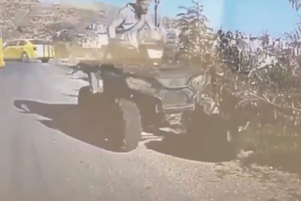 Video: Israeli settler drives ATV into Palestinian kneeling for prayer; IDF confiscates weapon