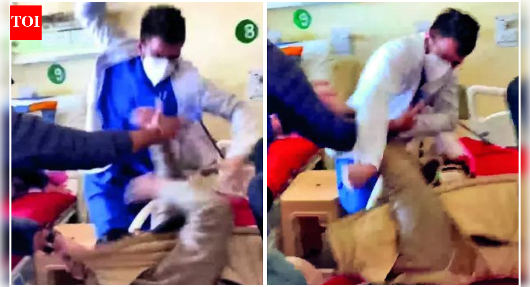 There’s a video of Raghav Nirula thrashing the patient, but Resident Doctors’ Association says his side of the story hasn’t been considered SHIMLA/KULLU: The Resident Doctors’ Association (RDA) of Indira Gandhi Medical College, Shimla — following backing from Himachal Medical Officers Association and RDAs of other medical colleges — announced an indefinite strike from 9.30 am Saturday, demanding immediate reinstatement of Dr Raghav Nirula, who was sacked on the recommendations of an inquiry report for assaulting a patient on December 22.They will be joined by govt doctors in other health facilities across the state. All routine services, OPDs and elective operation theatres will remain closed, but emergency services will continue to function, IGMC RDA announced Friday.CM Sukhvinder Singh Sukhu’s promise of a fresh inquiry cut no ice with the doctors, who see Nirula’s sacking as a “mob trial”. There’s a video of Nirula brutally thrashing the patient, who is also seen kicking him while lying in bed, but RDA said Nirula’s side of the story hasn’t been considered, and the termination is unjust.Himachal residents are already facing the brunt of the protest as govt doctors, excluding those on emergency and VIP duties, went on mass casual leave. Long queues were seen at OPD counters of regional and zonal hospitals in Kullu, Dharamshala, Una and Mandi.On Friday morning, representatives of IGMC RDA, HMOA and State Association of Medical and Dental College Teachers met the CM with their demands. RDA president Dr Sohail Sharma told mediapersons that Sukhu listened to them in detail, “considered all available evidence” and promised a fresh inquiry.The association alleged that Nirula received “direct threats to his life” and was warned to “leave the country”. RDA called for the immediate revocation of Nirula’s termination order. The association expressed concern over instances of “mob intimidation” inside the hospital, saying safety of healthcare workers was under threat and services were disrupted. It has demanded registration of FIRs and legal proceedings under BNS.“A fresh inquiry should be conducted to find out the exact circumstances that led to this incident. Moreover, govt should inquire into the threats made against the doctor by the patient’s attendants,” said Dr Satyavrat Vaidya, posted at Regional Hospital, Kullu.Former BJP CM and current LoP in assembly, Jai Ram Thakur, on Friday termed Nirula’s sacking a “harsh” move. “The decision to terminate Dr Raghav seems to have been taken in a hurry. A suspension order with a warning would have sufficed,” he said. RDA has also sought legal action over the vandalism of govt property during the December 22 fracas, and steps to end CCTV and security deficiencies at IGMC-Shimla.Ambulance staff stop work over wagesTo add to patients’ woes, around 1,300 employees of 108 and 102 ambulance services also went on a two-day strike across the state on Friday , demanding minimum wages. They staged protests and stopped work, impacting emergency services across Himachal. Protests were held in Una, Shimla, Kullu, Solan, Nahan, Chamba, Mandi, Dharamshala and Hamirpur as employees raised slogans against the company hired by the health department to run ambulance services. The employees’ union has alleged the firm isn’t giving them the basic salary ordered by various courts, including HP HC.End of ArticleFollow Us On Social MediaVideosH-1B Visa Delays: MEA Says India Has Flagged Issue With USIndia Flags H-1B Visa Delays With US As Indians Face Backlogs Scrutiny And Policy UncertaintyPM Modi Praises Gen Z Confidence, Sees Them Leading Viksit Bharat”People Who Are…” MEA Responds To Viral Mallya And Modi “Biggest Fugitive” VideoRed Line From New Delhi: India Calls Out Yunus Govt As Minority Attacks In Bangladesh EscalateMyanmar Heads to Polls After Five Years as Rights Groups Slam Military-Run Process’Can You Elect A Non-Muslim?’ Indian Student Dismantles Pakistan On Minority Rights, DemocracySix Shots On AMU Campus Kill Teacher As CCTV Shows Killers Firing Into His Head After He Fell DownPutin Called Pakistan A Junta With Nukes As Bush Feared Nuclear Leaks To Iran, Reveal TranscriptsTwo Indians Killed In Canada Within A Few Days, Families Raise Question On Safety Of Students Abroad123PhotostoriesSalman Khan birthday special: Best family moments5 Indian beaches that are perfect for quiet, unhurried vacationsTop 5 important lessons to teach your kids in 2026; something that school never teaches them5 fashion experiments of 2025 that were imaginative, structural, and deliciously bizarre5 ‘food from the future’ that already part of restaurant menus now5 forbidden places on Earth and what happens if a tourist tries to visit themAnkita Lokhande’s most stylish saree looks: From red bandhani to purple chiffon5 types of demons as per mythologyand what do they signifyAhead of ‘Jana Nayagan’ audio launch: Revisiting Thalapathy Vijay’s most ICONIC audio launch moments10 books whose first line is enough to convince anyone to read them123Hot PicksUAE WeatherPAN-Aadhaar linkingAmrit MondalGold rate todayIncome Tax RefundIndian Railways fareBank Holidays DecemberTop TrendingFrank Lampard and Christine Lampard Net WorthJordan Spieth Net WorthElliotte FriedmanKhamzat ChimaevTravis KelceAaron RodgersPatrick MahomesTua Tagovailoa WifeLaMelo BallMax Verstappen Girlfriend