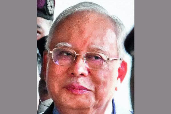Malaysia ex-PM Razak gets new jail term, .8 billion fine in 1 MDB case