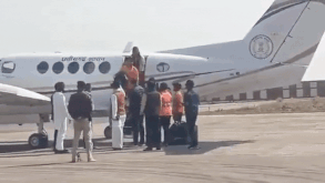 Visuals from viral video (Video credits/X@RoshanKrRaii)  NEW DELHI: A political row broke out in Chhattisgarh after a video went viral showing Bageshwar Dham head Dhirendra Shastri arriving on a government aircraft. The clip also shows a uniformed police officer touching the preacher’s feet.Chhattisgarh Congress communication department head Sushil Anand Shukla on Saturday alleged that arranging a government aircraft for Shastri amounted to “wastage of public money” and “misuse of the state exchequer.”The clip, widely circulated on social media, shows Shastri alighting from the aircraft along with state minister Guru Khushwant Saheb at Raipur airport. In the video, an on-duty police officer is seen first saluting the minister and then removing his cap and shoes before touching Shastri’s feet. Shastri had arrived in the state to attend a religious discourse in Bhilai town of Durg district.Shukla questioned under what constitutional provision the aircraft was made available to the preacher and demanded an official clarification. He claimed that Shastri was neither a recognised religious head nor a peethadhishwar of any established shrine or ashram and accused him of acting “against the country’s composite culture.”The Congress leader further alleged that Shastri promotes social discord, which he said runs contrary to the inclusive values of Sanatan Dharma. Referring to Lord Hanuman, Shukla said that Hanuman symbolises love, tolerance, bravery and forgiveness and those invoking his name should embody these values. “Superstition and hypocrisy cannot survive for long,” he added.The incident also sparked debate online, with several users criticising the alleged use of a government aircraft for a religious figure at taxpayers’ expense and calling the police officer’s gesture a “mockery of uniform ethics.” Others defended the officer, arguing that he followed official protocol by saluting the minister and later expressed personal faith.Responding to the criticism, the BJP defended both the officer and the government. State BJP chief spokesperson and MP Santosh Pandey said there should be no objection to a police officer offering obeisance to a religious guru out of personal belief.“Don’t (Muslim) railway employees and airport staff offer namaz at railway stations and airports? Why does it upset the Congress when a police officer bows to a guru out of personal faith?” he asked.On the use of the state aircraft, Pandey countered by asking the Congress to explain instances during its own tenure when government helicopters and planes were allegedly used by religious figures. He accused the Congress of being “against Sanatan Dharma,” citing remarks by opposition leaders that he said were derogatory to the faith.About the AuthorTOI News DeskThe TOI News Desk comprises a dedicated and tireless team of journalists who operate around the clock to deliver the most current and comprehensive news and updates to the readers of The Times of India worldwide. With an unwavering commitment to excellence in journalism, our team is at the forefront of gathering, verifying, and presenting breaking news, in-depth analysis, and insightful reports on a wide range of topics. The TOI News Desk is your trusted source for staying informed and connected to the ever-evolving global landscape, ensuring that our readers are equipped with the latest developments that matter most.”Read MoreEnd of ArticleFollow Us On Social MediaVideosOperation Aaghat 3.0 Crushes Crime As Delhi Police Arrest 660 Accused Ahead Of New Year CelebrationsBJP MP Anurag Thakur Links Ram Name Objection to Congress Decline, Defends New Rural Jobs LawNew Zealand PM Defends India FTA as Economic Game Changer Despite Sharp Objections from AllyFrom Tsunami To Economic Collapse: India Emerged As Sri Lanka’s First Responder, Says EnvoyJames Concert Cancelled After Attack In Bangladesh As MEA Slams Anti India Protests And Mob ViolenceH-1B Visa Delays: MEA Says India Has Flagged Issue With USIndia Flags H-1B Visa Delays With US As Indians Face Backlogs Scrutiny And Policy UncertaintyPM Modi Praises Gen Z Confidence, Sees Them Leading Viksit Bharat”People Who Are…” MEA Responds To Viral Mallya And Modi “Biggest Fugitive” VideoRed Line From New Delhi: India Calls Out Yunus Govt As Minority Attacks In Bangladesh Escalate123PhotostoriesIf it’s a bestseller, you must read it: 6 common myths about reading every parent should warn their child aboutYour date of birth reveals that one single thought can change your year 2026The bottlenecks still plaguing Mumbai-Goa national highway5 warming Korean drinks meant for long, cold wintersParenting in the AI age: What 2026 parents should knowSea moss: Modern superfood or just another trend? Potential benefits explained7 things you should not punish your child for even if you think it is good for them5 times Sara Ali Khan and Amrita Singh’s bond felt real, warm, and unfiltered18 best things to do on New Year’s Eve to ring in 20265 rock-cut temples beyond Ajanta & Ellora123Hot PicksUAE WeatherPAN-Aadhaar linkingAmrit MondalGold rate todayIncome Tax RefundIndian Railways fareBank Holidays DecemberTop TrendingFrank Lampard and Christine Lampard Net WorthJordan Spieth Net WorthRicky Tiedemann InjuryBode Miller Net WorthTravis KelceAnthony JoshuaPatrick MahomesRaghav ChadhaLaMelo BallMax Verstappen Girlfriend