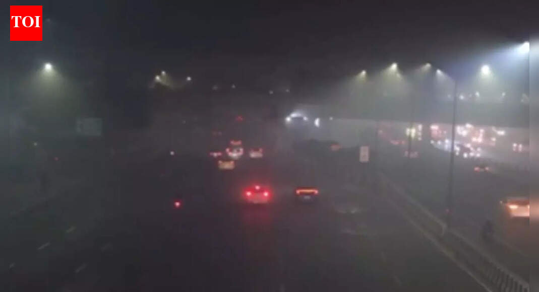 Screengrab: X/PTI Delhi-NCR witnessed severely reduced visibility late Sunday night as a dense blanket of smog engulfed the region.Visuals from several parts of the region, including AIIMS flyover and Noida’s Sector 37 showed vehicles struggling through a haze of toxic smog, highlighting the severity of the pollution.The blow is twofold, as the city grapples with cold winter temperatures alongside rising pollution levels. The Meteorological Department has issued an orange alert for very dense fog on Monday, warning commuters of restricted visibility on major roads. Maximum and minimum temperatures are expected around 22°C and 7°C, respectively, with Sunday night’s minimum dipping to 6.3°C, slightly below the seasonal average The city’s air quality slipped into the “very poor” category, with several areas, including Anand Vihar, recording hazardous AQI levels above 400. Authorities advised residents, especially children, the elderly, and those with respiratory issues, to stay indoors.Under Stage III of the Graded Response Action Plan (GRAP), officials have imposed curbs on construction and industrial activity, while enforcing the ‘No PUC, No Fuel’ rule to control vehicular emissions.Experts have cautioned that poor air quality will likely continue under the prevailing weather conditions.About the AuthorTOI News DeskThe TOI News Desk comprises a dedicated and tireless team of journalists who operate around the clock to deliver the most current and comprehensive news and updates to the readers of The Times of India worldwide. With an unwavering commitment to excellence in journalism, our team is at the forefront of gathering, verifying, and presenting breaking news, in-depth analysis, and insightful reports on a wide range of topics. The TOI News Desk is your trusted source for staying informed and connected to the ever-evolving global landscape, ensuring that our readers are equipped with the latest developments that matter most.”Read MoreEnd of ArticleFollow Us On Social MediaVideosOwaisi Urges Protection of Bangladesh Minorities Ahead of February Polls‘Love Jihad Claim False’: UP Woman Speaks Out After Bajrang Dal Crashes BirthdayUnnao Rape Case: Activists Protest Outside Delhi High Court Over Sengar BailShashi Tharoor Responds To Digvijaya Singh, Says Congress Needs Discipline, Not Lessons From RSSPakistan FM Says Islamabad Will Proactively Rebuild Relations With Bangladesh Post PollsHadi Killing: Dhaka Police Say Main Accused Escaped to India via MeghalayaPakistan FM Ishaq Dar Admits India Hit Nur Khan Air Base In Operation Sindoor Strikes‘Advised Me To Hide In Bunker’: Pak President Zardari On Op Sindoor, Responds To PM Modi’s WarningIndian Army Intensifies Anti-Terror Ops In J&K To Flush Out Pak Terrorists Amid Chillai KalanBJP Hails Shashi Tharoor’s Remarks On India’s Foreign Policy, Congress Hits Back123Photostories5 Bangkok facts you probably didn’t knowTV soaps that went off air in 2025: ‘Bade Achhe Lagte Hain 4’ to ‘Suman Indori’Is foul-smelling poop a symptom of cancer?TV celebrities who passed away in 2025: From Satish Shah to Achyut PotdarBloating vs belly fat: Easy signs that tell the difference and why it matters10 rice dishes from around the worldAntibiotic resistance: Why common infections are getting harder to treatThalapathy Vijay fitness secrets: How simple workouts and balanced food keep him fit at 516 strange and haunting lines from books and classicsFrom hydrogen-powered water taxi to ethereal Ganga aarti: 5 reasons to visit Varanasi123Hot PicksKuwait NYEPAN-Aadhaar linkingJeffrey EpsteinGold rate todayIncome Tax RefundIndian Railways fareBank Holidays DecemberTop TrendingFrank Lampard and Christine Lampard Net WorthJordan Spieth Net WorthJake Paul and Jutta Net WorthBode Miller Net WorthTravis KelceWayne GretzkyPatrick MahomesNavjot Singh SidhuChloe KimNew York Yankees