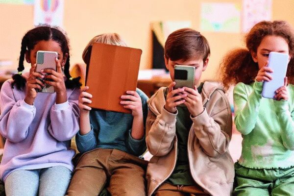 Worn down by worry, parents look longingly at Australia’s social media ban