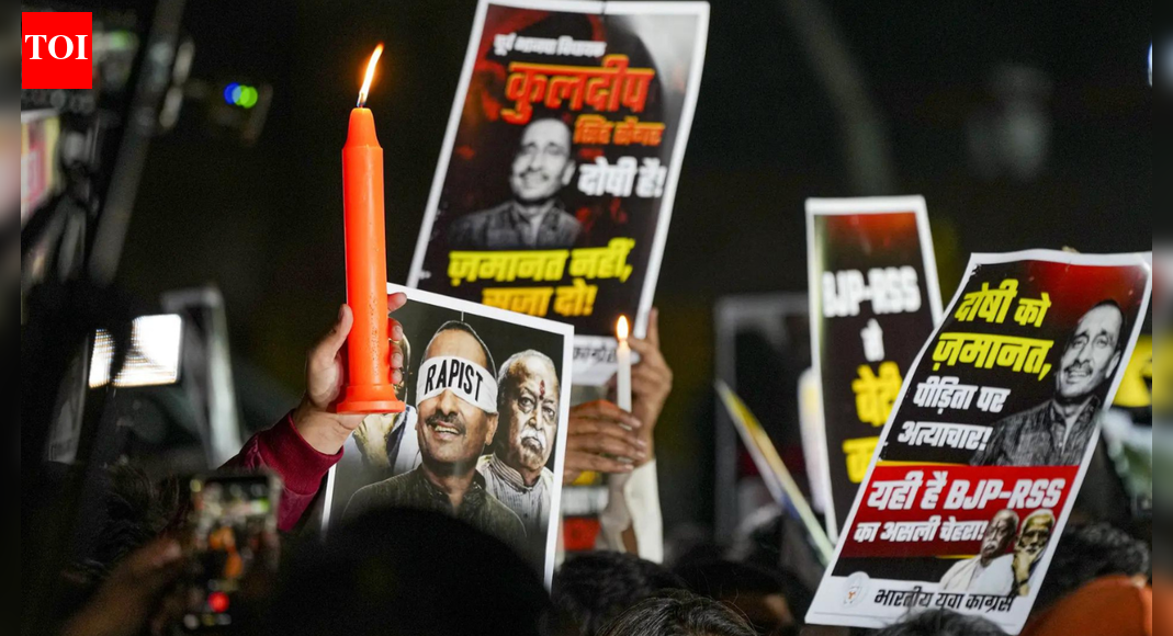 NEW DELHI: The Supreme Court on Monday stepped in to stay the Delhi high court order that suspended the former BJP leader Kuldeep Singh Sengar’s life sentence in the 2017 Unnao rape case. On the Central Investigation Bureau’s plea challenging the HC order, Supreme Court bench flagged serious legal concerns over the interpretation of the law and the implications it could have for accountability of elected representatives.A three-judge vacation bench led by Chief Justice Surya Kant, along with Justices JK Maheshwari and Augustine George Masih, stayed the execution of the high court’s December 23 order that had suspended Sengar’s life sentence under the POCSO Act.Unnao Rape Case: Activists Protest Outside Delhi High Court Over Sengar BailSupreme Court made it clear that Sengar would not be released from jail, noting that he continues to remain in custody in another case related to the custodial death of the rape survivor’s father.While acknowledging that sentence suspensions are not usually stayed without hearing the convict, the bench said the “peculiar facts” of the case warranted immediate intervention.”Issue notice. We have heard solicitor general Tushar Mehta for CBI and senior advocate for the convict… Counter will be filed in four weeks. We are conscious of the fact that when a convict or an undertrial has been released, such orders are not ordinarily stayed by this court without hearing such persons. But in view of peculiar facts where the convict is convicted for a separate offence, we stay the operation of the Delhi high court order dated December 23, and thus the respondent shall not be released pursuant to the said order,” the bench ordered.The ‘public servant’ interpretationAt the heart of the CBI plea is whether an MLA can be treated as a “public servant” for the purpose of aggravated offences under the POCSO Act.Appearing for the CBI, solicitor general Tushar Mehta argued that Sengar, who was a powerful MLA at the time of the crime, exercised dominance over the minor survivor and squarely fell within the scope of aggravated sexual assault under the law.Sengar’s counsel, senior advocates Siddharth Dave and N Hariharan, countered this by arguing that an MLA could not automatically be treated as a public servant under POCSO.The Supreme Court, however, expressed unease with the high court’s reasoning, warning that such an interpretation could lead to lawmakers being exempted from stricter punishment.”We are worried that a constable or patwari will be a public servant under the Act, but an MLA or MP will not be and get exempted,” the bench observed.Why it mattersSection 5 of the POCSO Act treats sexual assault as “aggravated” if committed by a public servant or a person in a position of authority, attracting a minimum punishment of 20 years that can extend to life imprisonment.In 2019, a Delhi trial court had held that Sengar qualified as a public servant and sentenced him to imprisonment for the remainder of his natural life. The high court’s suspension of that sentence had triggered sharp criticism, with the CBI arguing that it diluted the intent of the law.The Supreme Court has now issued notice to Sengar and will examine whether the high court erred in excluding legislators from the definition of “public servant” under POCSO Act.Survivor welcomes SC interventionMeanwhile, the Unnao rape survivor welcomed the Supreme Court’s order, saying she had full faith in the justice system and felt reassured by the apex court’s intervention.”I am very happy. I had faith in the Supreme Court. I will ensure that he is given a death sentence,” she said speaking to the reporters.The survivor’s mother has asked for security for her family and advocate saying, “My family needs security. Our advocates need security. I request that the government keep us all safe.”(With agency inputs)About the AuthorTOI News DeskThe TOI News Desk comprises a dedicated and tireless team of journalists who operate around the clock to deliver the most current and comprehensive news and updates to the readers of The Times of India worldwide. With an unwavering commitment to excellence in journalism, our team is at the forefront of gathering, verifying, and presenting breaking news, in-depth analysis, and insightful reports on a wide range of topics. The TOI News Desk is your trusted source for staying informed and connected to the ever-evolving global landscape, ensuring that our readers are equipped with the latest developments that matter most.”Read MoreEnd of ArticleFollow Us On Social MediaVideosArgentina Backs India’s Permanent UNSC Seat, Says World Order Has Changed Beyond 1945 ModelSupreme Court Halts Bail For Ex-BJP MLA Kuldeep Sengar In Unnao Rape Case, Signals Tough Stand’Called Chinki, Chinese, Momo’: Tripura Student’s Killing In Dehradun Triggers Protests Across StateBangladesh Faces Political Rupture As Student Leaders Back Jamaat While Minority Attacks ContinueAt Least One Dead After Fire Engulfs 2 Coaches Of Ernakulam Express With 158 On Board In Andhra“Violence Being Used to Stop Polls”: Ex-Spy Lucky Bisht on Bangladesh KillingsOwaisi Urges Protection of Bangladesh Minorities Ahead of February Polls‘Love Jihad Claim False’: UP Woman Speaks Out After Bajrang Dal Crashes BirthdayUnnao Rape Case: Activists Protest Outside Delhi High Court Over Sengar BailShashi Tharoor Responds To Digvijaya Singh, Says Congress Needs Discipline, Not Lessons From RSS123PhotostoriesIn Pics | How Southern Railway Is Switching to Recycled Sewage Water for Daily OperationsHow Tulsi Ginger Haldi Kadha soothes sore throat and boost immunity; recipe insideMumbai Aims High: Metro Line 2B And Shunya Bridge Target Seamless Suburban ConnectivityMumbai Central line maintenance push: Track work taken up during Mulund–Matunga mega blockMumbai’s Bhandup Gets Connectivity Boost as New FOB Eases East–West Pedestrian MovementTop 5 richest cities in India by GDP in 2025Winter Special: How to make Lehsuni Chicken Curry for lunch10 Turkish desserts one must try at least once‘Lokah: Chapter One – Chandra’, ‘Laalo’ to ‘Su From So’: Regional movies that won hearts in 20255 major wedding trends of 2025 that might be seen in 2026 too123Hot PicksSilver price todayPAN-Aadhaar linkingCristiano RonaldoGold rate todayIncome Tax RefundIndian Railways fareBank Holidays DecemberTop TrendingMatt Hardy and Reby Sky Net WorthTravis KelcePatrick MahomesRobert Kraft & Gayle Benson Net WorthAjit PawarLebron JamesWWE Raw PreviewUnnao Rape CaseRajkumar BafnaNew York Yankees