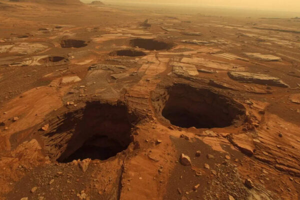 What are the strange caves that scientists recently found on Mars