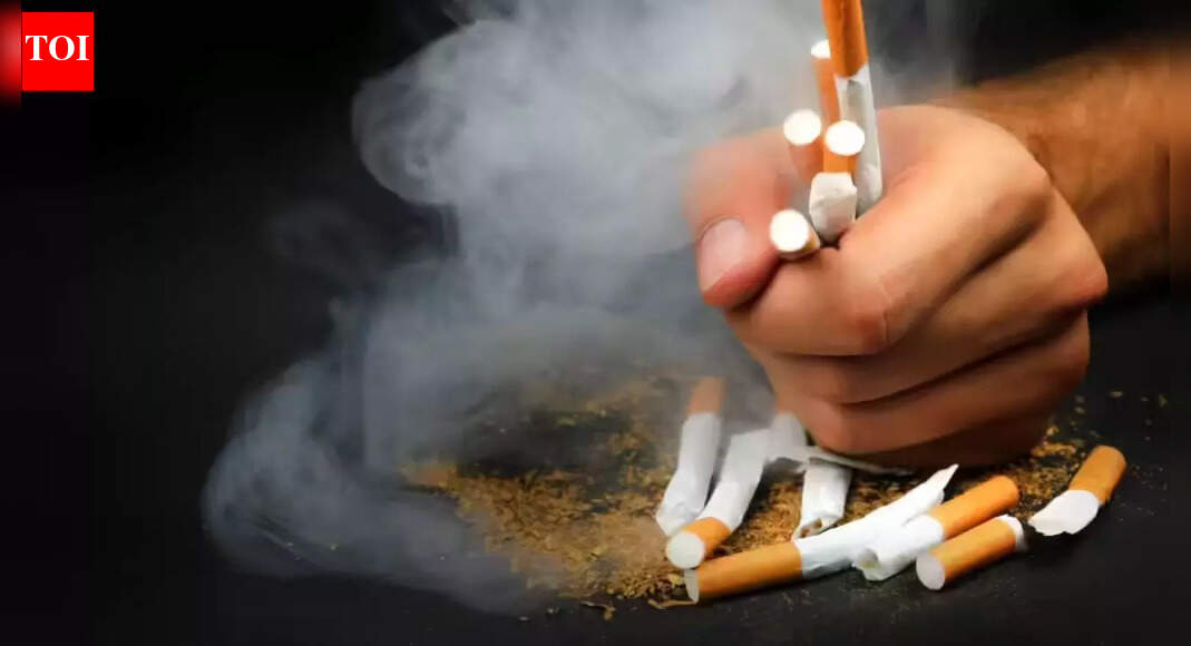 ITC hit by cigarette tax shock! Brokerages downgrade stock as hike darkens outlook. Should you buy, sell or hold?