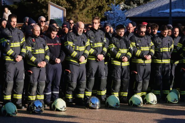 Hundreds march in silence to honor victims of Swiss bar fire that left 40 dead