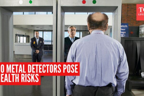 Are there any health risks of walking through metal detectors?