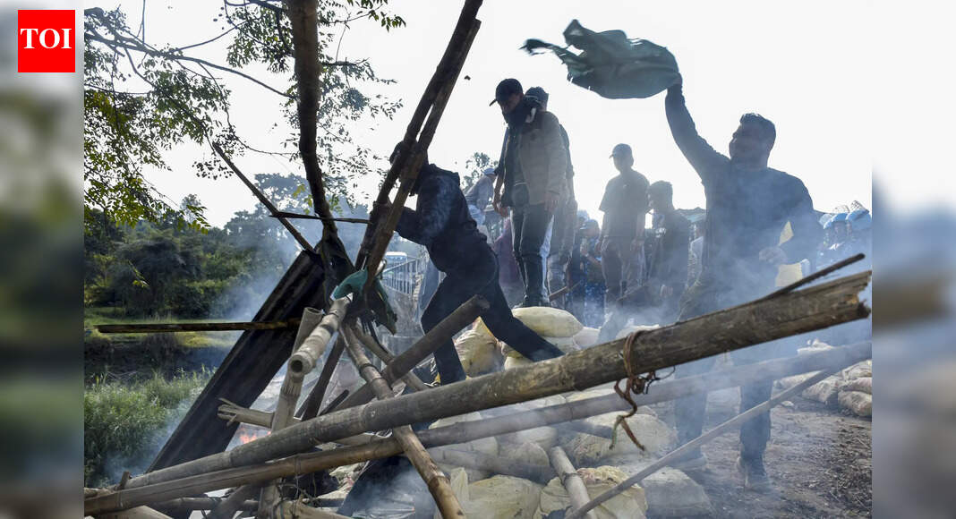 (PTI Photo) IMPHAL: A succession of bombs, suspected to have been planted by militants, exploded at Saiton Nganukon village of Manipur’s Bishnupur Monday, injuring two people and triggering a backlash against security forces for what villagers alleged was slipshod surveillance, reports Donald Sairem.The explosions began 5.30am with two IEDs damaging the abandoned residence of Salam Mani, who is living in a relief camp at Keibul Lamjao since ethnic violence erupted in May 2023. At 8.45am, a pair of IEDs went off 200m away, injuring retired CRPF trooper Soibam Sanatomba (51), and Nongthombam Indubala (37). Both were admitted to a govt hospital with splinter injuries, but are reported to be out of danger. Some unexploded IEDs were found later and safely disposed of, officials said.Several organisations have announced a 24-hour statewide shutdown beginning Wednesday midnight to protest the incident.(With inputs from PTI)End of ArticleFollow Us On Social MediaVideos‘Really Happy For Others’: SC Rejects Umar Khalid’S Bail; Partner Shares His Reaction“Trump’s Interest Is Clear”: Ex-Diplomat Slams Venezuela ActionCPI-M Protests Near Us Consulate In Chennai Over Venezuela AttackBJP Welcomes SC Denial Of Bail To Umar Khalid And Sharjeel Imam; Opposition Calls It Unfortunate”US Has No Jurisdiction in Venezuela” Ex-UN Envoy Dilip Sinha Slams US Action In VenezuelaAfter T20 World Cup Move, Bangladesh Now Bans IPL 2026 Broadcast Amid Mustafizur Rahman RowSC Rejects Bail Plea Of Umar Khalid, Sharjeel Imam; Grants Bail To 5 Others In Delhi Riots CaseRajnath Singh Commissions ICG’s Pollution Control Vessel ‘Samudra Pratap’, Hails Make-In-IndiaShashi Tharoor, Manish Tewari & Salman Khurshid Raise Concerns Over US Attack In Venezuela’Whole Of Jammu And Kashmir Should Be Reunited With India’: British MP Bob Blackman123PhotostoriesBirthday special: Best songs of Diljit DosanjhAR Rahman birthday special: From ‘Chaiyya Chaiyya’ to ‘Chaka Chak’ — his best Bollywood songs5 powerful money lessons from Morgan Housel’s bestselling book ‘The Psychology of Money’Chef Sanjeev Kapoor shares comforting flavours of Gujarat that are worth trying this winterDeepika Padukone birthday special: From Denmark roots to Bollywood stardom4 foods that may help slow down ageingHeart health: The big 3 heart numbers to know, as per Harvard experts7 legendary Indian scientists and their contributionsHow to make Paneer Bread Pakoda for evening snacking5 foods that steadily cause hair loss without you knowing about it123Hot PicksUS strikes VenezuelaVande Bharat Sleeper TrainPublic holidays January 2026Gold rate todayUmar Khalid BailCigarette tax hikeBank Holidays JanuaryTop TrendingSan Francisco 49ersCardi BQuinn HughesKyle TuckerSidney Crosby LifestyleTyrese Haliburton and Jade Jones Net WorthKevin StefanskiChicago Bulls vs Boston CelticsJohn PyleKevin Durant vs LeBron James Net Worth