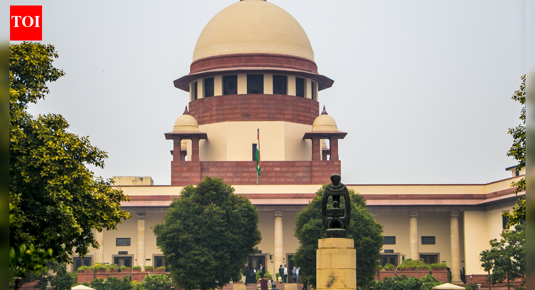NEW DELHI: Supreme Court on Monday slammed the Uttarakhand govt for being a silent spectator for two decades to rampant encroachment of forest land in Rishikesh, which was allotted in 1950 to Gandhian Mira Behn by the then UP govt, and said it smacked of nexus between the executive and squatters. The court also sought details of such illegal constructions.A bench of CJI Surya Kant and Justice Joymalya Bagchi said the facts of this case, prima facie, show how private individuals systematically grabbed thousands of acres of forest land while the state govt remained in slumber from 2000 till 2023.Uttarakhand’s deputy advocate general Jatinder Kumar Sethi informed the court that the state had recovered around 500 acres of forest land from encroachers in 2023 and an additional 50 acres in the drive carried out in the last three days at Rishikesh. He said the state would continue the drive against encroachers.However, the bench said the way squatters enjoyed residential rights unauthorisedly over vast tracts of forest land for more than two decades indicated collusion among politicians, bureaucrats and encroachers. It asked the state to file a detailed affidavit describing the extent of encroachment, nature of constructions and the officers who were at the helm of affairs between 2000-2023 for protection of govt land in the area.Of the 2,866 acres of land notified as forest area by the state, a part was leased to Pashulok Sewa Samiti, which was an organization associated with Pashulok Ashram established by British born Mira Behn (Madeleine Slade). The society came under liquidation and surrendered 594 acres of land to the forest department on Oct 23, 1984. Yet certain private individuals took control of the land.The bench in its previous order had said, “What seems shocking to us is that the State of Uttarakhand and its authorities are sitting as silent spectators when the forest land was being systematically grabbed in front of their eyes.” It enlarged the scope of the petition and directed the state’s chief secretary and principal chief conservator of forest to constitute an inquiry committee to examine all issues and submit a report to SC.“Meanwhile, all private individuals are restrained from alienating the land, encumbering it or creating any third-party rights. It goes without saying that no construction activity shall be allowed to take place either. The vacant land (other than the residential houses) shall be taken into possession by the forest department and the collector concerned,” the bench had ordered on Dec 22 last year.End of ArticleFollow Us On Social MediaVideos‘Really Happy For Others’: SC Rejects Umar Khalid’S Bail; Partner Shares His Reaction“Trump’s Interest Is Clear”: Ex-Diplomat Slams Venezuela ActionCPI-M Protests Near Us Consulate In Chennai Over Venezuela AttackBJP Welcomes SC Denial Of Bail To Umar Khalid And Sharjeel Imam; Opposition Calls It Unfortunate”US Has No Jurisdiction in Venezuela” Ex-UN Envoy Dilip Sinha Slams US Action In VenezuelaAfter T20 World Cup Move, Bangladesh Now Bans IPL 2026 Broadcast Amid Mustafizur Rahman RowSC Rejects Bail Plea Of Umar Khalid, Sharjeel Imam; Grants Bail To 5 Others In Delhi Riots CaseRajnath Singh Commissions ICG’s Pollution Control Vessel ‘Samudra Pratap’, Hails Make-In-IndiaShashi Tharoor, Manish Tewari & Salman Khurshid Raise Concerns Over US Attack In Venezuela’Whole Of Jammu And Kashmir Should Be Reunited With India’: British MP Bob Blackman123PhotostoriesBirthday special: Best songs of Diljit DosanjhAR Rahman birthday special: From ‘Chaiyya Chaiyya’ to ‘Chaka Chak’ — his best Bollywood songs5 powerful money lessons from Morgan Housel’s bestselling book ‘The Psychology of Money’Chef Sanjeev Kapoor shares comforting flavours of Gujarat that are worth trying this winterDeepika Padukone birthday special: From Denmark roots to Bollywood stardom4 foods that may help slow down ageingHeart health: The big 3 heart numbers to know, as per Harvard experts7 legendary Indian scientists and their contributionsHow to make Paneer Bread Pakoda for evening snacking5 foods that steadily cause hair loss without you knowing about it123Hot PicksUS strikes VenezuelaVande Bharat Sleeper TrainPublic holidays January 2026Gold rate todayUmar Khalid BailCigarette tax hikeBank Holidays JanuaryTop TrendingSan Francisco 49ersCardi BQuinn HughesKyle TuckerSidney Crosby LifestyleTyrese Haliburton and Jade Jones Net WorthKevin StefanskiChicago Bulls vs Boston CelticsJohn PyleKevin Durant vs LeBron James Net Worth
