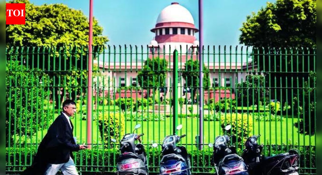NEW DELHI: Supreme Court on Monday slammed Uttarakhand govt for being a silent spectator for two decades to rampant encroachment of forest land in Rishikesh, which was allotted in 1950 to Gandhian Mira Behn by the then UP govt, and said it smacked of nexus between the executive and squatters. The court also sought details of such illegal constructions. A bench of CJI Surya Kant and Justice Joymalya Bagchi said the facts of this case, prima facie, show how private individuals systematically grabbed thousands of acres of forest land while state govt remained in slumber from 2000 till 2023. Uttarakhand’s deputy advocate general Jatinder Kumar Sethi informed court that the state had recovered around 500 acres of forest land from encroachers in 2023 and an additional 50 acres in the drive carried out in the last three days at Rishikesh. He said the state would continue the drive against encroachers.However, the bench said the way squatters enjoyed residential rights unauthorisedly over vast tracts of forest land for more than two decades indicated collusion among politicians, bureaucrats and encroachers. It asked the state to file a detailed affidavit describing the extent of encroachment, nature of constructions and the officers who were at the helm of affairs between 2000-2023 for protection of govt land in the area.Of the 2,866 acres of land notified as forest area by the state, a part was leased to Pashulok Sewa Samiti, which was an organisation associated with Pashulok Ashram established by British born Mira Behn (Madeleine Slade). The society came under liquidation and surrendered 594 acres of land to the forest dept on Oct 23, 1984. Yet certain private individuals took control of the land.The bench had said, “What seems shocking to us is that Uttarakhand and its authorities are sitting as silent spectators when the forest land was being systematically grabbed in front of their eyes.” It enlarged the scope of the petition and directed the state’s chief secretary and principal chief conservator of forest to constitute an inquiry committee to examine all issues and submit a report to the SC.”Meanwhile, all private individuals are restrained from alienating the land, encumbering it or creating any third-party rights,” the bench had ordered on Dec 22 last year.End of ArticleFollow Us On Social MediaVideosUS Senator Claims India Cut Russian Oil Buys And Sought Trump Tariff Relief Amid Pressure Bid On OilVHP Calls Out Bangladesh Chief Adviser Yunus’ ‘Empire of Unrest’ After 6 Hindus Killed In 18 DaysPathankot Arrest Of 15-Year-Old Spy Exposes Strategy Of Pakistan ISI Targeting Minors Against IndiaBangladesh Unrest Claims Two More Hindu Lives As Six Killings In 18 Days Raise Minority Safety Fears‘Really Happy For Others’: SC Rejects Umar Khalid’S Bail; Partner Shares His Reaction“Trump’s Interest Is Clear”: Ex-Diplomat Slams Venezuela ActionCPI-M Protests Near Us Consulate In Chennai Over Venezuela AttackBJP Welcomes SC Denial Of Bail To Umar Khalid And Sharjeel Imam; Opposition Calls It Unfortunate”US Has No Jurisdiction in Venezuela” Ex-UN Envoy Dilip Sinha Slams US Action In VenezuelaAfter T20 World Cup Move, Bangladesh Now Bans IPL 2026 Broadcast Amid Mustafizur Rahman Row123PhotostoriesTop gut health foods to add to your diet in 20265 signs you are emotionally invested more than your partnerWinter Special: How to make classic Palak Paneer for lunch at homeWhat Your Birth Date Says About You (More Than You Think)5 must-visit pilgrimage places for blessings and good luck in 2026Working parents and the myth of ‘quality time’; Here’s how parents manage work while giving time to their kidsPriyanka Chahar Choudhary’s stunning ethnic style game: From sarees to lehengaYour birth date can make you rich in 2026Why vitamin deficiencies often show up on your face or hairWhat is sarcopenia and why muscle loss begins earlier than you think123Hot PicksBudget 2026Vande Bharat Sleeper TrainPublic holidays January 2026Gold rate todayUS Visa BondsCigarette tax hikeBank Holidays JanuaryTop TrendingSan Francisco 49ersCardi BQuinn HughesKyle TuckerSidney Crosby LifestyleTyrese Haliburton and Jade Jones Net WorthKevin StefanskiChicago Bulls vs Boston CelticsJohn PyleKevin Durant vs LeBron James Net Worth