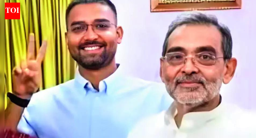 PATNA: The fate of Bihar’s panchayati raj minister Deepak Prakash hangs in the balance as Rashtriya Lok Morcha (RLM), founded and led by his father and former Union minister Upendra Kushwaha, looks set to split with three of the four party legislators likely to stake claim over the organisation as part of the NDA.The three MLAs — Rameshwar Mahto, Madhav Anand and Alok Kumar Singh — are reportedly angry with Kushwaha for making his son a minister despite his not being a member of either House of the state’s bicameral legislature. If that happens, neither BJP nor Janata Dal United — the two major NDA partners — will make Deepak an MLC, which he needs to become within six months to continue as a minister in the Nitish Kumar cabinet.Everyone was surprised when Kushwaha, whose Rajya Sabha membership expires in April, named his son, Deepak, as a minister from RLM quota instead of wife and Sasaram MLA Snehlata. If RLM indeed splits, prospects of another Rajya Sabha term for Kushwaha may also dim. Five Bihar seats in the Lower House are falling vacant in April.Bajpatti MLA Rameshwar Mahto said, “The decision to make Deepak a minister was wrong. We hoped Kushwaha would see reason, but in vain. The three of us are together but have not decided our next step — whether to leave the party or not — yet.”Madhav Anand, who is MLA from Madhubani, told TOI on phone from Delhi that RLM was united. “We will sit and discuss things if there is any resentment,” he said.The three MLAs had skipped the recent “litti party” hosted by Kushwaha and preferred to meet Nitin Nabin the same day after his appointment as BJP national working president. Mahto was unsparing when reminded that Kushwaha made his son minister “to keep the party united”, as he had said.“CM Nitish Kumar is my mentor, who always believes in doing what he says. I came with Kushwaha for his stand against dynastic politics. I could never imagine that he is floating the party for ‘Parivar’ politics. I have a roaring business and do politics to serve the poor, not for ‘parivar’. Party workers have hopes from their representatives… I started a charitable trust hospital for the poor soon after election,” Mahto said.However, RLM chief spokesman Ram Pukar Sinha said the party is united and everyone is working hard to make it stronger.Kushwaha, who had earlier founded RLSP which he later merged with JDU, served as Union minister of state for education in the first Modi govt from 2014-2019. Since then, he or his party has had little success till the Nov 2025 Bihar assembly election in which RLM managed to win four seats.About the AuthorJai Narain PandeyThe writer has a vast experience of over 30 years in the field of journalism, as a reporter and a news editor. He has officiated as a bureau head and presided over the local desk in Patna and abroad. He has covered a variety of topics, from politics to sports, in India and abroad. He has covered top golfers and tennis players in tournaments held in Doha (Qatar).Read MoreEnd of ArticleFollow Us On Social MediaVideos”BJP People Are Mute” Owaisi Targets PM Modi Over Trump’s ‘Make Me Happy’ RemarkBMC Becomes Mega Battleground As Thackerays Reunite And Alliances Shift Ahead Of Civic Wars 2026Deepam row: Piyush Goyal Accuses MK Stalin Govt Of Targeting Hindu TraditionsDonald Trump, Venezuela And India: Prithviraj Chavan’s Remark On PM Modi Kidnapping Sparks Row’Hindus Will Not Be Allowed To Stay’: BNP Candidate’s Threat Sparks Alarm Amid Bangladesh KillingsNepal Imposes Curfew In Birgunj Near India Border After Social Media Sparks Religious TensionsHyderabad Techie Murdered In US: Father Denies Love Angle, Seeks Justice Across BordersIndia Speeds Up Chenab Hydropower Projects, Redrawing Indus Rivers Water Control Lines For PakistanPolitical War Erupts After JNU Slogans Target PM Modi Following Umar Khalid Bail Rejection VerdictUS Senator Claims India Cut Russian Oil Buys And Sought Trump Tariff Relief Amid Pressure Bid On Oil123PhotostoriesRobin Sharma reveals 5 super habits to be successful in lifeBirthday special: Bipasha Basu’s best movies to watch on OTTChef Sanjeev Kapoor shares 14 kitchen tips that make life easierHow to make Anda Paratha for breakfastJiya Shankar and her love for ethnic wear: Surreal looks in sarees, lehengas, and more12 railway stations and the foods they are famous forFull list of the winners of ‘MasterChef India’: From Pankaj Bhadouria to Mohammed Ashiq5 simple neck exercises to ease stiffness and restore mobilityWhere will you be this Makar Sankranti? 5 best destinations in India to witness the festivalFrom opening up about losing a leg in a tragic accident to being unemployed for 7 years after Naache Mayuri: When Sudha Chandran spoke about life, parent’s support and career123Hot PicksBudget 2026Vande Bharat Sleeper TrainPublic holidays January 2026Gold rate todayUS Visa BondsCigarette tax hikeBank Holidays JanuaryTop TrendingSan Francisco 49ersPaige Bueckers vs Sophie Cunningham Net WorthWho is Lenny DykstraYouTube Ad Changes In VietnamWayne GretzkyKliff KingsburyKevin StefanskiChicago Bulls vs Boston CelticsTaylor SwiftWho is Kris Humphries