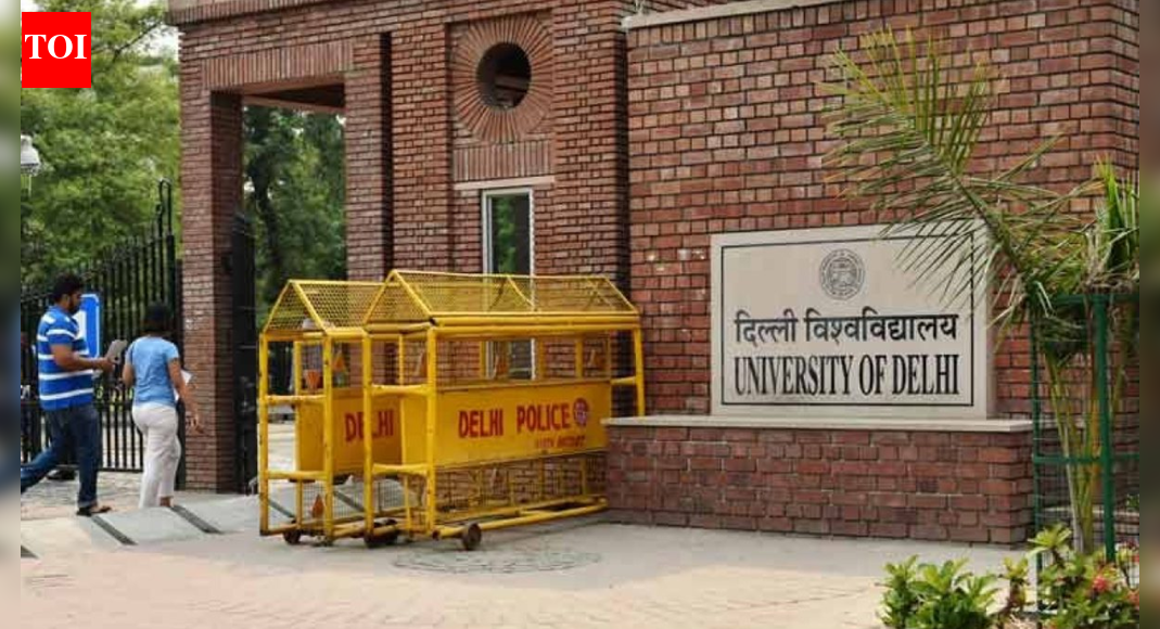 . NEW DELHI: ‘Bol ke lab azaad hain tere,’ scribbled across a yellow chart paper, fought for space alongside a poster exhorting freshers to join the Akhil Bharatiya Vidyarthi Parishad. During the high-decibel Delhi University Students’ Union (DUSU) polls in Sept, the walls of democracy at North Campus gave opposing student parties the opportunity to stand neck-and-neck-at least on paper-and more. On Wednesday evening, however, when two women students affiliated with the Students’ Federation of India (SFI) attempted to paste posters opposing the Viksit Bharat Shiksha Adhishthan Bill near St. Stephen’s College, they were shocked to learn that the walls no longer ‘existed’.  A video shows at least seven security staff stopping the duo.  Only five months ago, Delhi University (DU) had notified guidelines against defacement of walls, especially during the student election season. It also asked departments and colleges to increase the size of these walls of democracy as much as possible at two notified locations. DU’s North and South Campuses have several such walls, typically marked with a university-installed board reading ‘Wall of Democracy’ for easy identification.  Walls adjacent to St. Stephen’s College, near the Faculty of Arts, and opposite Daulat Ram College were among those officially designated.  During student elections, anti-defacement committees were set up to ensure that posters were pasted only on these walls. Outside election periods, students have also used them to display posters related to protests, meetings and political or social issues.  In a social media post, the student body alleged that the guards tore down the posters and verbally informed them of the university’s decision. Students also claimed that the boards identifying these walls were removed without prior notice.  DU proctor Manoj Kumar on Thursday confirmed that the walls had been denotified. He, however, did not provide any reason for the decision or indicate whether it had been communicated to students. He also did not clarify whether colleges had been asked to follow suit. A college principal said no one had asked them to follow in the university’s footsteps, so far.  The organisation submitted a complaint to the proctor’s office on Thursday, demanding the immediate reinstatement of the walls.  In its complaint, the SFI said the removal was carried out without any consultation with students or student organisations. It added that the walls have historically served as an important democratic space for students to express opinions and engage in political and social dialogue within the university.  Calling the move an attempt to stifle democratic expression, students said the shrinking of such spaces undermines the democratic character of DU.About the AuthorSugandha JhaSugandha Jha is a journalist with over half a decade of experience covering education, social affairs, and current news. With a sharp eye for numbers and a strong grounding in data-driven reporting, she brings clarity and insight to complex issues. Beyond the newsroom, she’s passionate about exploring regional cuisine and the stories behind what we eat. Her work blends analytical rigour with human interest, offering readers nuanced perspectives across diverse subjects.Read MoreEnd of ArticleFollow Us On Social MediaVideosBJP Targets Mamata Banerjee Over ED Raid At I-PAC, Alleges Evidence TamperingFrom Op Sindoor To Venezuela: How Chinese Air Defence And Radar Systems Continue To Fail NationsDipu Das Lynching: Bangladesh Police Arrest Man Who Incited Mob As Attacks Against Hindus ContinueFrance Ditches Global South, Collective West As Jaishankar Warns Europe Of Changing World Order’Naughty, Nasty HM’: Mamata Slams Amit Shah After ED Raids TMC Leader Amid SIR RowPM Modi Launches ‘Somnath Swabhiman Parv’, Recalls Centuries-Old Resolve Behind Temple’s Revival“US Using Tariffs To Pressure India” Sareen Slams Trump Over Russia Sanction BillDonald Trump Pulls US Out Of India-Led Solar Alliance In Sweeping Exit From 66 Global AgenciesNew CCTV Footage Raises Questions Over Planning Behind Turkman Gate Clashes During Midnight DriveMinor Shooter Accuses National Coach Of Sexual Assault, NRAI Suspends Him Pending Police Inquiry123PhotostoriesHow to deal with difficult people without losing your cool: 5 effective psychology-based tipsBirthday Special: Farhan Akhtar’s movies to watch on OTTFarhan Akhtar’s social media moments with wife and kids10 smart and comforting sooji dishes to enjoy for breakfastExclusive: Viraj Bahl on the public admiration he’s been getting due to Shark Tank India; says ‘I still feel embarrassed when people ask me for selfies’‘Toxic’: Kiara Advani, Nayanthara to Rukmini Vasanth: Meet the leading ladies of Yash’s highly anticipated comeback filmHow to make comforting Gajar Matar Ki Sabzi at home10 most democratic countries in the world12 banana desserts enjoyed around the world’The Office’ to ‘Modern Family’: Best sitcoms to watch on Peacock123Hot PicksMinneapolis Woman ShootMaharashtra civic pollsGold rate todayUAE citizenshipCigarette price hikePublic holidays January 2026Bank Holidays JanuaryTop TrendingCandace OwensTommy Fleetwood and Clare Fleetwood Net WorthTravis KelceBrandon TatumQuinn HutsonRic Flair Net Worth in 2025Rashee RiceMarshon Lattimore ArrestAnthony EdwardsStefon Diggs