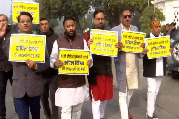 ANI file photo  Aam Aadmi Party (AAP) MLAs on Friday staged a protest outside the Delhi assembly against the state government. AAP MLA Sanjeev Jha accused the BJP-led state government of trying to divert attention from key issues in Delhi, such as law and order, contaminated water, pollution and the Yamuna by circulating a “fraudulent” video involving LoP Atishi. He demanded action against Delhi Minister Kapil Mishra and others who shared the clip with an alleged wrong transcription. ‘Can’t Stay Two Days In Delhi’: Gadkari On Severe Pollution, Transport Sector Role Speaking to ANI, Jha said, “There are various issues in Delhi, law and order, contaminated water, Yamuna, pollution and to avoid these problems, BJP has made a fraudulent video and dragged the name of Guru Sahab into it so that discussions cannot be done on the real issues…Delhi Minister Kapil Mishra posted a video with the wrong transcription, we want action against him and those who shared that video. They should be suspended for six months”A day earlier, the Delhi Assembly witnessed chaos as BJP MLAs protested against AAP over alleged remarks by LoP Atishi on a Sikh Guru.Then AAP MLAs entered the Assembly carrying posters and chanting slogans, demanding the resignation of Kapil Mishra.The winter session of the Delhi Legislative Assembly commenced on January 5 (Monday) and will continue until January 8.AAP MLA and Deputy Leader of Opposition Mukesh Ahlawat wrote to Speaker Vijendra Gupta regarding allegations against Atishi and the circulation of videos related to the matter.In his letter, Ahlawat stated, “The video tweeted by Kapil Mishra is not part of the official record of the Assembly, which raises serious concerns about how he obtained the video footage. Even in the footage tweeted by him, it is clear that LoP Atishi is saying, “Then please conduct the discussion. Why have you been running away since morning? You are saying, ‘respect dogs, respect dogs.’ Hon’ble Speaker, please allow a discussion on this matter.”The Aam Aadmi Party legislative party has demanded that the full footage from the Assembly cameras be provided, in which the statement by LoP Atishi is clearly visible and audible.Further, the cancellation of the Delhi Assembly membership of Kapil Mishra for circulating false videos. Suspension for six months of all other MLAs who circulated a manipulated video along with a false transcription. End of ArticleFollow Us On Social MediaVideos‘India Can Balance A Chaotic World’: French President Macron On BRICS, Multipolarity, Power Politics‘India Will Not Be Anybody’s Vassal’: French President Macron’s Remark During Jaishankar MeetMeet Tina Shah, The Indian American Doctor Running For US Congress in New Jersey Democratic RaceBJP Targets Mamata Banerjee Over ED Raid At I-PAC, Alleges Evidence TamperingFrom Op Sindoor To Venezuela: How Chinese Air Defence And Radar Systems Continue To Fail NationsDipu Das Lynching: Bangladesh Police Arrest Man Who Incited Mob As Attacks Against Hindus ContinueFrance Ditches Global South, Collective West As Jaishankar Warns Europe Of Changing World Order’Naughty, Nasty HM’: Mamata Slams Amit Shah After ED Raids TMC Leader Amid SIR RowPM Modi Launches ‘Somnath Swabhiman Parv’, Recalls Centuries-Old Resolve Behind Temple’s Revival“US Using Tariffs To Pressure India” Sareen Slams Trump Over Russia Sanction Bill123PhotostoriesTara Sutaria and Veer Pahariya reportedly part ways after one year? 5 times the couple proved that style never fadesHow to make Kolhapuri Chicken Curry for lunchMahhi Vij addresses divorce with Jay Bhanushali: ‘It didn’t work out but he has not run away from the responsibility of our kids’Katrina Kaif, Shah Rukh Khan to Kareena Kapoor: Bollywood stars who danced to songs bearing their namesFired from work? How to find a new job quickly that you like7 signs you might be spiritually gifted (even if you don’t realise it yet)Chef Sanjeev Kapoor shares 10 fun and creative ways to enjoy eggs5 manifestation mistakes and how to fix themHow to make South Indian Upma for breakfastFarhan Akhtar birthday special: ‘Dil Chahta Hai’ ,‘Rock On!!’ to ‘Toofaan’, 5 inspiring films to stream on OTT123Hot PicksTrump Mexico NewsTrump Denmark NewsGold rate todayBengaluru newsCigarette price hikePublic holidays January 2026Bank Holidays JanuaryTop TrendingCandace OwensTommy Fleetwood and Clare Fleetwood Net WorthTravis KelceICE Shooting VictimSarfaraz KhanRic Flair Net Worth in 2025Patrick Mahomes InjuryUnion BudgetDelhi AQIStefon Diggs