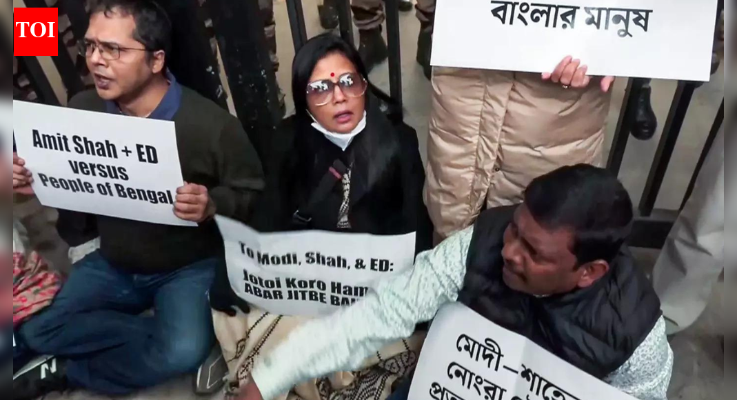 Mahua Moitra along with other TMC leaders protested outside Amit Shah’s residence (ANI image) NEW DELHI: Trinamool Congress MP Mahua Moitra on Friday accused the Centre of misusing central agencies after she was detained by Delhi police while protesting outside union home minister Amit Shah’s office against the Enforcement Directorate (ED) raids on political consultancy firm I-PAC in Kolkata.Reacting after her detention, Moitra alleged that the ED was being used to target political opponents and steal sensitive electoral information. “You have seen how the government is using the ED as their agency to steal information, election strategy of their political opponents. ED was sent to the office of our political consultant for dacoity of information. They are talking about some 7–8 years old coal scam; you didn’t get time to gather information in all these years. Mamata Banerjee showed how to fight against them. People of Bengal will teach them a lesson,” she said.Earlier, as she and other TMC MPs including Derek O’ Brien were taken away by police, Moitra posted on X, claiming force was used during the detention. “Amit Shah’s cops dragging us in police vans to police station. Bring it on BJP Bengalis — you’ll be eaten by the Bengal Tigress, Mamata Banerjee,” she wrote.Speaking to reporters, Moitra also objected to the detention of protesters, stating, “Even here, we are protesting peacefully, yet you can see how we are being picked up — every time, you see it for yourself, how they drag us away.”TMC MP Kirti Azad in a post on X wrote, “Detained at Parliament Street Police Station. No FIR has been registered so far. We have not been told the reason for the same. No senior officer is available. If this is what is happening to elected members of Parliament, we can understand what must be the plight of a common man.” Meanwhile, BJP MP Ravi Shankar Prasad defended the ED raids, drawing parallels with the fodder scam investigation involving RJD chief Lalu Prasad Yadav.Addressing a press conference Prasad said, “This raid is similar to the one during the fodder scam case against Lalu Prasad. He was later arrested, but he never stormed the CBI office as Mamata Banerjee did. What link does Mamata have with that firm?”The protest followed ED searches at multiple locations linked to I-PAC in Kolkata on Thursday, including the residence of its chief, Pratik Jain. I-PAC provides political consultancy services to the TMC and manages parts of the party’s IT and media operations.Meanwhile, the TMC on Friday moved the Calcutta High Court seeking restraint on the “misuse and dissemination” of documents and data seized during the ED searches. The party has termed the raids politically motivated and aimed at intimidating it ahead of the West Bengal Assembly elections. CM Banerjee further alleged that party documents, hard disks and sensitive data were being seized under the guise of an investigation. Questioning the role of the ED and Amit Shah, Banerjee said, “Is it the duty of the ED, Amit Shah to collect the party’s hard disk, candidate list?… The nasty, naughty Home Minister who cannot protect the country and is taking away all my party documents. What will be the result if I raid the BJP party office?”She also linked the agency action to the ongoing Special Intensive Revision (SIR) exercise in West Bengal, alleging that voter names were being deleted ahead of the polls.“On one side, they are deleting the names of all the voters by carrying out the SIR in West Bengal…Because of the elections, they are collecting all the information about my party,” she said. Banerjee further dared the BJP to fight the TMC politically if it wanted to win Bengal.About the AuthorTOI World DeskAt TOI World Desk, our dedicated team of seasoned journalists and passionate writers tirelessly sifts through the vast tapestry of global events to bring you the latest news and diverse perspectives round the clock. With an unwavering commitment to accuracy, depth, and timeliness, we strive to keep you informed about the ever-evolving world, delivering a nuanced understanding of international affairs to our readers. Join us on a journey across continents as we unravel the stories that shape our interconnected world.Read MoreEnd of ArticleFollow Us On Social MediaVideosJaishankar Sends ‘Bad Neighbour’ Pakistan On Anti-India Rant Again, Calls Operation Sindoor Reckless’No Call From PM Modi’: Trump Aide Lutnick’s Shocker On India-US Trade Deal Amid Tariff Threats‘India Can Balance A Chaotic World’: French President Macron On BRICS, Multipolarity, Power Politics‘India Will Not Be Anybody’s Vassal’: French President Macron’s Remark During Jaishankar MeetMeet Tina Shah, The Indian American Doctor Running For US Congress in New Jersey Democratic RaceBJP Targets Mamata Banerjee Over ED Raid At I-PAC, Alleges Evidence TamperingFrom Op Sindoor To Venezuela: How Chinese Air Defence And Radar Systems Continue To Fail NationsDipu Das Lynching: Bangladesh Police Arrest Man Who Incited Mob As Attacks Against Hindus ContinueFrance Ditches Global South, Collective West As Jaishankar Warns Europe Of Changing World Order’Naughty, Nasty HM’: Mamata Slams Amit Shah After ED Raids TMC Leader Amid SIR Row123PhotostoriesYour Birth Date Is Not Random—It Holds a Dark TruthTara Sutaria and Veer Pahariya reportedly part ways after one year? 5 times the couple proved that style never fadesHow to make Kolhapuri Chicken Curry for lunchMahhi Vij addresses divorce with Jay Bhanushali: ‘It didn’t work out but he has not run away from the responsibility of our kids’Katrina Kaif, Shah Rukh Khan to Kareena Kapoor: Bollywood stars who danced to songs bearing their namesFired from work? How to find a new job quickly that you like7 signs you might be spiritually gifted (even if you don’t realise it yet)Chef Sanjeev Kapoor shares 10 fun and creative ways to enjoy eggs5 manifestation mistakes and how to fix themHow to make South Indian Upma for breakfast123Hot PicksTrump Mexico NewsTrump Denmark NewsGold rate todayBengaluru newsCigarette price hikePublic holidays January 2026Bank Holidays JanuaryTop TrendingCandace OwensTommy Fleetwood and Clare Fleetwood Net WorthTravis KelceICE Shooting VictimSarfaraz KhanRic Flair Net Worth in 2025Patrick Mahomes InjuryUnion BudgetDelhi AQIStefon Diggs