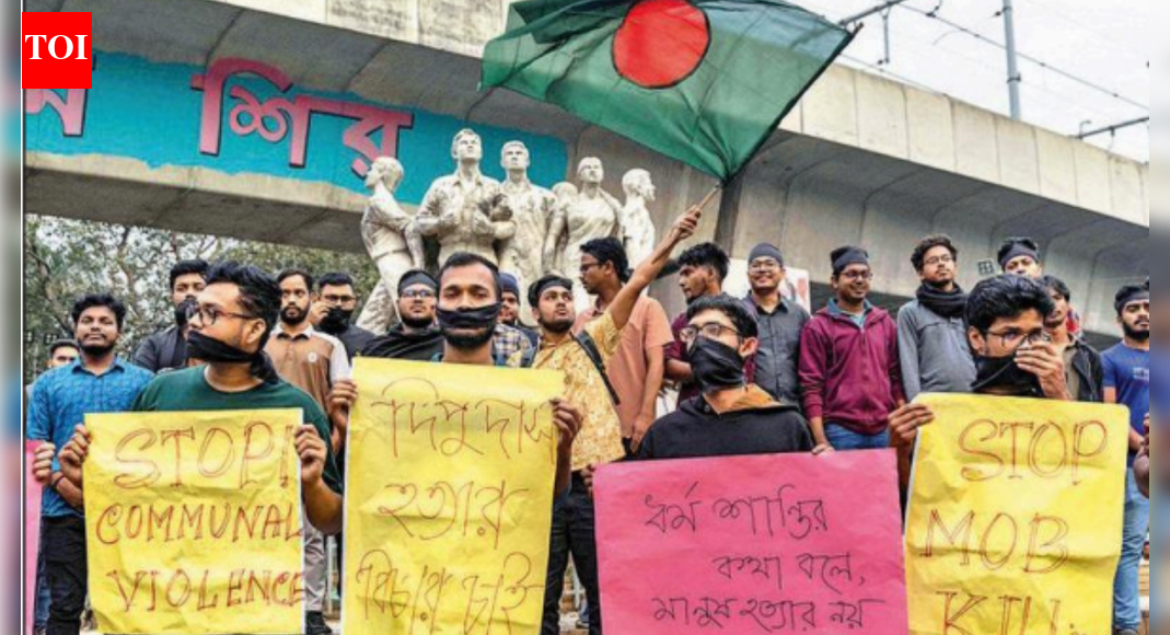 A student protest against Dipu’s murder, in Dhaka last month NEW DELHI: Slamming the Muhammad Yunus-led interim govt over the relentless attacks on minorities – including Hindus – and their properties in Bangladesh, and for watering down the incidents, India on Friday said attempts to whitewash the communal intent behind the crimes and attribute these to “personal rivalries and political differences” only “emboldens the perpetrators”. Seven Hindu men have been killed in Bangladesh since Dec 18 – the day garment factory worker Dipu Chandra Das was lynched and his body hanged from a tree and set ablaze in Mymensingh, a killing that India described as “horrendous” and “barbaric”. Of the seven, three, including a journalist, were killed this week. “We continue to witness a disturbing pattern of recurring attacks on minorities as well as their homes and businesses by extremists. Such communal incidents need to be dealt with swiftly and firmly,” ministry of external affairs spokesperson Randhir Jaiswal said in his weekly briefing. The others killed in violence against Hindus were Amrit Mandal (Dec 24); factory security guard Bajendra Biswas (Dec 29); businessman Khokon Chandra Das (Dec 31); journalist Rana Pratap and businessman Moni Chakraborty (Monday); and Mithun Sarkar (Tuesday). In a briefing following the lynching of Mandal, who Dhaka said was a “listed criminal”, Jaiswal on Dec 26 said over 2,900 incidents of violence against minorities, including cases of killings, arson, and land grab, had been documented by independent sources during the tenure of the interim govt and these incidents could not be brushed aside as mere media exaggeration or dismissed as political violence. The Yunus-led administration has repeatedly dismissed India’s concerns as propaganda by Indian media. The internal situation deteriorated in Bangladesh after the death of radical leader and India-baiter Sharif Osman Hadi on Dec 18, a prominent face of the 2024 anti-govt protests that led to then PM Sheikh Hasina abdicating and fleeing to India.End of ArticleFollow Us On Social MediaVideosCEPA A Win-Win For India And Chile, Key Focus On Market Access And Minerals: Chile EnvoyMamata Banerjee Hits Streets, Leads Kolkata Rally Against ED RaidsAfter Meeting PM Modi, AI Innovators Share Insights That Could Change The GameAmit Shah Outlines Foolproof NIDMS Mechanism To Counter Future Terror AttacksIndia No Longer Imports Arms, UP Leads Defence Manufacturing: Rajnath Singh’Not Accurate’: India Hits Back After Trump Aide Blames PM Modi For Delayed Trade DealMEA Calls For Firm Action As India Flags Disturbing Pattern Of Attacks On Minorities In BangladeshPM Modi To Host German Chancellor Merz In Gujarat As India-Germany Ties Enter Strategic Phase’PM Modi-Trump Held 8 Calls In 2025′: India Rejects Lutnick’s Claim On Stalled Trade AgreementThe Day CBI Arrested Indira Gandhi And Sonia’s Pasta Maker That May Have Saved The Day For Cong123PhotostoriesBirthday special: Hrithik Roshan’s social media moments with Saba Azad and familyBirthday Special: Hrithik Roshan’s movies to watch on OTTTaarak Mehta Ka Ooltah Chashmah: From calling Dilip Joshi the ‘pillar of the show’ to reacting to Disha Vakani aka Dayaben’s return, Sharad Sankla aka Abdul gets candid7 moon-kissed baby names for your little princessCurry-smelling kangaroos to banana bees: 6 animals that surprisingly smell like foodWhat teachers wish parents understood‘Hum Paanch’, ‘Dekh Bhai Dekh’, ‘Yes Boss’: Top TV comedy shows from the 90What students learn in school beyond the syllabusFrom ‘Highway’ to ‘Chhichhore’: 5 times mainstream films embraced unconventional charactersSadhguru’s Drumstick Soup is a winter must-have; recipe inside123Hot PicksTrump Mexico NewsTrump Denmark NewsGold rate todayBengaluru newsCigarette price hikePublic holidays January 2026Bank Holidays JanuaryTop TrendingCandace OwensTommy Fleetwood and Clare Fleetwood Net WorthTravis KelceVanessa BryantLos Angeles KingsBoston Celtics vs Toronto RaptorsLeBron JamesJa MorantWPL Live ScoreStefon Diggs