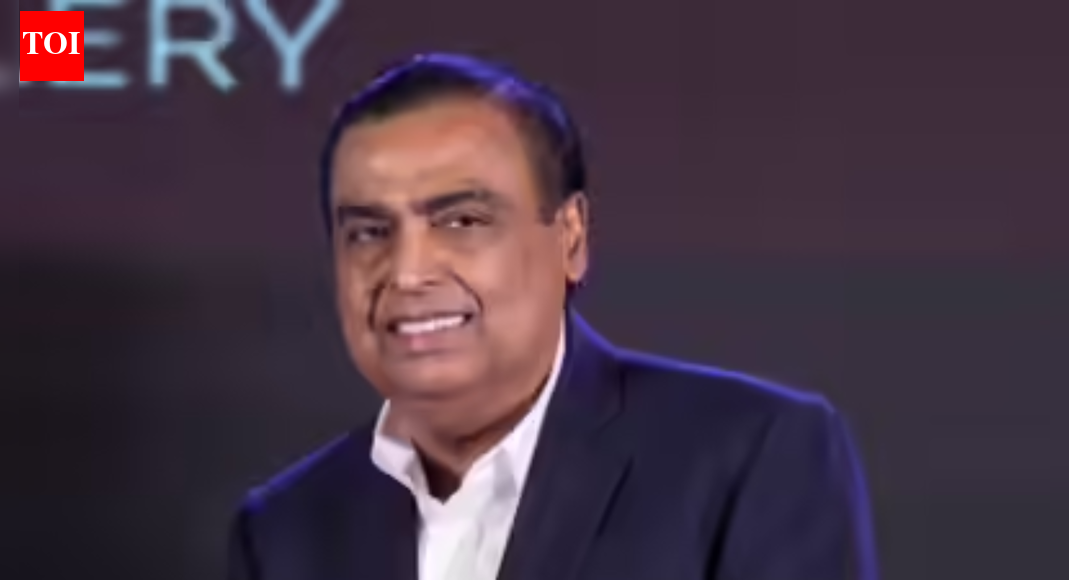 . AHMEDABAD: Reliance Industries CMD Mukesh Ambani on Sunday hailed India’s resilience amid global uncertainty and said challenges created by this geopolitical situation cannot touch or trouble the country due to the “invincible protective wall called Narendra Modi”.Let the world know that this is India’s defining decade under the PM’s leadership, Ambani asserted while addressing the Vibrant Gujarat Regional Conference (VGRC) for Kutch and Saurashtra region in Rajkot.The Vibrant Gujarat Regional Conference (VGRC) was inaugurated on Sunday afternoon by the PM, who said India is currently witnessing an era of unprecedented certainty and political stability, a time when the world is experiencing uncertainty.Underlining India’s resilience amid global uncertainty, the billionaire industrialist said, “The world is changing very fast, the geopolitical situation is creating new challenges and unexpected turbulence. What is reassuring for India is that these challenges cannot touch or trouble our people because India has the invincible protective wall called Narendra Modi.” The country is not just preparing for the future but shaping it, he said.”From Saurashtra and Kutch we in industry are happy to participate in this growth and direction that PM Modi has shown all of us,” Ambani said.Speaking at VGRC, Ambani said Reliance is committed to make Gujarat India’s Artificial Intelligence (AI) pioneer, adding that his companies will double their investment in the state from Rs 3.5 lakh crore to 7 lakh crore in the next five years.”Reliance is committed to making Gujarat the AI pioneer of India. In Jamnagar we are building India’s largest AI ready data centre with a single goal – affordable AI for every Indian.,” he said.Jio will launch a people-first intelligent platform in India, for India and the world for enabling every citizen, starting from Gujarat, to access AI services in their own device and language everyday to make them more efficient and productive, Ambani added.Ambani also committed to invest at an “unprecedented scale” in Gujarat and said that he would double his investment in Gujarat.”Reliance is already Gujarat’s largest investor. In the last five years, we have invested over Rs 3.5 lakh crore. I am pleased to announce we will double this to Rs 7 lakh crore over the next five years, creating exponential employment, livelihoods and greater ‘sampathi’ (wealth) for every Gujarati, and every Indian,” he said.Ambani said Reliance is committed to global leadership in clean energy and green materials.”At Jamnagar, we are building the world’s largest integrated clean energy ecosystem, spanning solar, battery energy storage, green hydrogen, green fertilizer, sustainable aviation fuel and maritime fuels and advanced materials. These are not only industries of the future, they are foundations of India’s prosperous tomorrow,” he pointed out.Jamnagar, once the largest hydrocarbon energy exporter, will in the coming years become India’s largest exporter of green energy and materials, Ambani added.”Industry stands for transforming Kutch into a global clean energy hub. Our multi-gigawatt utility scale solar project, among the world’s largest, will deliver round-the-clock clean power through advanced storage and modern grid integration, powering India’s green future and reinforcing Gujarat’s leadership in renewables,” the industrialist said.Partnering in India’s Olympic ambitions and social progress, the Reliance Foundation is prepared to support the Prime Minister’s vision of hosting the 2036 Olympic Games in Ahmedabad, Ambani said.”As a concrete step, Reliance will partner with the Gujarat government to manage the Veer Savarkar Multi-Sports Complex in Naranpura. The complex is envisioned as a hub for hosting national and international sporting events and for training India’s future champions,” Ambani said.End of ArticleFollow Us On Social MediaVideos‘Attack On My Life’: Suvendu Adhikari Targets Mamata Banerjee, Levels Serious AllegationUkrainian Envoy Hails PM Modi As Global Leader, Praises Ukraine Peace EffortsChirag Paswan Hits Out At Tejashwi Yadav Over ‘People Lost In Democracy’ commentIndia’s Reform Express Accelerates Growth and Investment, Says PM ModiAmit Shah Confident BJP Will Form Government In Kerala In 2026, Vote Share ClimbingOwaisi Blames Congress, Hits Out at UAPA After SC Denies Bail To Umar Khalid‘Some Historians, Politicians Tried To Whitewash History Of Invaders’: PM Modi Hits Out In Somnath‘Hijab-Clad PM’ Row: Owaisi’s ‘Tubelight’ Jab At Himanta Sarma Over ‘Only Hindu PM’ RemarksRSS Chief Mohan Bhagwat Calls For Hindu Unity, Says India Will Lead World In 20–30 YearsPM Modi Offers Prayers At Somnath Temple, Witnesses Grand Drone Show & Fireworks At Swabhiman Parv123PhotostoriesSobhita Dhulipala’s most graceful saree looks – PicsHow to make Instant Rava Appe for breakfastCute parenting moments of Kareena Kapoor and Saif Ali KhanInside Nupur Sanon and Stebin Ben’s stylish Christian weddingLohri 2026: 11 must-try Punjabi dishes to celebrate Lohri‘The Raja Saab’: Educational qualification of the star cast10 things 90s kids begged their parents for, that Gen Z will be shocked even existed7 baby girl names inspired by Indian holy places that parents secretly love8 countries around the world most famous for their wildlifeSamantha Ruth Prabhu’s timeless saree looks that redefine elegance123Hot PicksTrump tariffsUS Supreme CourtGold rate todayBengaluru newsCigarette price hikePublic holidays January 2026Bank Holidays JanuaryTop TrendingUS Border Petrol Agent ShootCanada Immigration Applications 2026Kim KardashianVanessa BryantTrump TariffsConnor McDavidNFL PlayoffsAlex BregmanNandani SharmaFortnite Updates