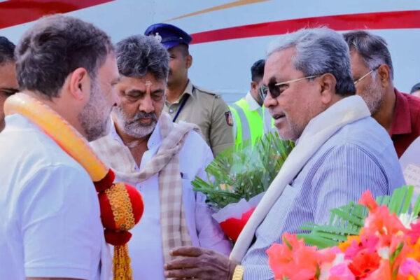 Rahul Gandhi, DK Shivakumar and Siddaramaiah NEW DELHI: Congress leader Rahul Gandhi briefly met Karnataka chief minister Siddaramaiah and deputy CM DK Shivakumar at the Mysuru airport on Tuesday, fuelling speculation amid the ongoing power tussle between the two state Congress stalwarts. The interaction took place on the tarmac during Gandhi’s transit halt while returning to Delhi from Tamil Nadu. He spoke to both leaders, separately and together. Gandhi transited through Mysuru twice during the day—while travelling to Tamil Nadu and again on his return—with Siddaramaiah and Shivakumar present on both occasions.While the contents of the discussion are not known, party sources said it centred on the Congress’ “Save MGNREGA” campaign and the Karnataka government’s contribution to push for restoration of the 2006 legislation implemented by the erstwhile Congress-led Union government. The meeting came as both leaders were seeking an appointment with Gandhi.Siddaramaiah is reportedly pressing for a Cabinet reshuffle, while Shivakumar wants clarity on a leadership change. Party insiders believe approval for a reshuffle would indicate Siddaramaiah is set to complete his full term, weakening the prospects of Shivakumar, who also heads the party’s state unit.Speculation over a potential leadership change has intensified since the Congress government crossed the halfway mark of its term in November last year, amid reports of an unconfirmed power-sharing arrangement at the time of government formation in May 2023. Siddaramaiah later told reporters there was “no confusion” within the party and said no political discussions took place during his meeting with Gandhi.(With PTI inputs)About the AuthorTOI News DeskThe TOI News Desk comprises a dedicated and tireless team of journalists who operate around the clock to deliver the most current and comprehensive news and updates to the readers of The Times of India worldwide. With an unwavering commitment to excellence in journalism, our team is at the forefront of gathering, verifying, and presenting breaking news, in-depth analysis, and insightful reports on a wide range of topics. The TOI News Desk is your trusted source for staying informed and connected to the ever-evolving global landscape, ensuring that our readers are equipped with the latest developments that matter most.”Read MoreEnd of ArticleFollow Us On Social MediaVideosCentre Steps In To Scrap 10 Minute Delivery Timers After Safety Fears In India’s Gig Economy GrowMarvel Meets Maharashtra Politics, AI Reels On Civic Polls Turn Thanos, Hulk, Spider-Man Into NetasUS Threatens 25% Tariff on India-Iran Trade, Indian Rice Exporters Warn of LossesIndia To Face 75% US Tariffs After Trump’s Big Iran Announcement?Operation Sindoor Turning Points Revealed: Army Chief Tells What Forced Pakistan To Seek CeasefirePakistan’s Most Loyal Terror Proxy Against India Shows Signs Of Collapse, LeT Cadres Turn On ISILotus Takes Centre Stage As India Sets Tone For BRICS Presidency At Crucial 20 Year Milestone’Aag Laga Doonga’: Bajrang Dal member faces FIR for threatening to burn police station in UPCanada’s Largest Gold Theft Probe Names Indian Links, Three More Arrested In Auto Scam’May Not Need IMF Loans In 6 Months’: Pakistan Eyes JF-17 Sales Surge To Save Economy123Photostories5 reasons why wildlife enthusiasts are heading to Ranthambore right now5 legendary landmarks in Asia named after animalsMakar Sankranti 2026: How to make traditional Moong Dal Khichdi at homeWhy anxiety disorder in teens is on the riseBeautiful Makar Sankranti saree looks inspired by Bollywood actresses in 2026Bengaluru’s metro lifeline gets a boost: Yellow line to roll out 7th train, shorter waits aheadShark Tank India: From a lavish house worth Rs 50 crores to high-end car collection- Namita Thapar’s lavish lifestyleMakar Sankranti 2026: 10 traditional foods to celebrate the harvest and the sun8 jungle experiences that only Masai Mara offers and how to visit on a budget7 questions to ask your child’s teacher if your child struggles with attention123Hot PicksShaksgam ValleyDubai AirportGold rate todayBengaluru news10-minute deliveryPublic holidays January 2026Bank Holidays JanuaryTop TrendingMumbai Indians vs Gujarat GiantsCharlie KirkVanessa Bryant and Natalia Bryant Net WorthBrooks Koepka and Jena Sims Net WorthDrake Maye WifeBill GatesConnor McDavid WifeTariffs on Tehran Trade PartnersBengaluru Dental Student SuicideMLB Trade Rumors