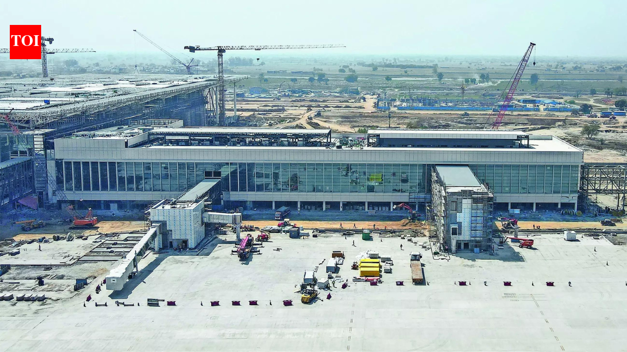 NEW DELHI: Even before Noida International Airport at Jewar commences operation, two MNCs – Panama-headquartered UETA Inc and Singapore-based Heinemann Asia Pacific – have locked horns over allotment of duty-free and retail outlets at the soon to be operationalised airport that would decongest traffic at Delhi airports.UETA on Tuesday challenged before the Supreme Court a decision of the Delhi HC rejecting its challenge to the tender process for setting up, development, operation, maintenance and management of duty-free outlets and retail outlets at Noida International Airport. It challenged the award of licence to the consortium of Heinemann-BWC Forwarders.Appearing for UETA, senior advocate Mukul Rohatgi said the HC erroneously rejected its petition saying no cause of action has arisen in Delhi and hence Delhi HC had no jurisdiction to adjudicate the dispute. He said the corporate office of NIAL was in Delhi and the letters were addressed from there giving clear jurisdiction to the HC.NIAL and Heinemann through their counsel said that the airport is in Uttar Pradesh and that the corporate office of NIAL has since shifted from Delhi to Noida but a camp office is maintained in Delhi to receive correspondence.The bench of CJI Surya Kant, and Justices Joymalya Bagchi and Vipul M Pancholi said that even though issue of territorial jurisdiction of Delhi HC over the dispute is debatable, since the counsel for both parties are in Delhi, it would make no difference if Delhi HC adjudicated this dispute on merits.End of ArticleFollow Us On Social MediaVideosSatya Nadella Recounts 2023 Story Of Indian Farmer Leveraging AI Bot For SubsidiesPolice Arrest MZ Wiztown Owner Abhay Kumar Over Noida Techie Yuvraj Mehta’s DeathOwaisi Defends Hijab-Clad PM Dream, Says Constitution Allows It77th Republic Day Parade to Witness Debut of DRDO’s Hypersonic Anti-Ship MissilePM Modi Endorses Nitin Nabin As New BJP Chief; 200% Trump Tariff On French Champagne?One Year Of Trump 2.0: How India-US Ties Went From Strategic Ties To Strategic Stress In 12 MonthsInside Jaish’s Kargil-Style Terror Bunker In J&K Where Maggi, Rice, Gas And Grenades Were StockedEU Puts India At Core Of Historic Trade Reset At Davos, Ursula Leyen Terms It ‘Mother Of All Deals’PM Modi Says Parties Shielding Illegal Immigrants Must Be Exposed, Calls It a National ThreatFrom Karyakarta To Party President: Nitin Nabin Becomes BJP’s Youngest-Ever Chief123PhotostoriesLesser-known facts about Brooklyn Beckham’A Knight of the Seven Kingdoms’: Everything to know about the new Westeros spin-offHow to make Punjabi Lobia Masala for dinner at home‘Jana Nayagan’: Everything to know about trailer, posters, cast and more of Thalapathy Vijay’s starrer amid CBFC delayTop 10 countries with the highest government debtFrom Nimona to Samosa: 9 delicious local dishes made with Green Peas5 reasons you could be on the next layoff list of your companyBaby names as beautiful as a melody‘Sheila Ki Jawani’, ‘Munni Badnaam Hui’, ‘Baby Doll’: Bollywood item songs that broke the internet with their zany lyricsRanbir Kapoor’s ‘Badtameez Dil’ to Nora Fatehi’s ‘Dilbar’: Iconic dance steps from Bollywood songs everyone still tries to copy123Hot PicksSilver price todayBudget 2026Karnataka DGP ScandalGold price predictionNitin NabinPublic holidays January 2026Bank Holidays JanuaryTop TrendingMatthew StaffordKyle Larson and Katelyn Sweet Net WorthKlay ThompsonElina Svitolina and Gael Monfils Net WorthShane Lowry Net WorthTom BradyPaul Scholes and Claire Froggatt Net WorthJohn Harbaughs WifeNHL TradeKelly Piquet