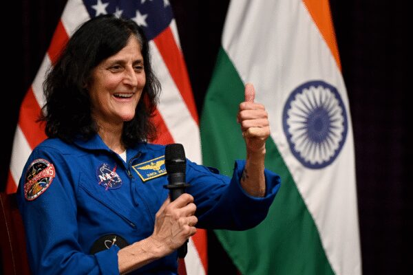 NEW DELHI: “When I reached International Space Station for the first time, the first thing I did was to locate India (on Earth), from where my father belonged to, and Slovenia, from where my mother belonged,” said Indian American astronaut Sunita Williams in Delhi on Tuesday — the only female astronaut who has set the world record for most cumulative spacewalking time by a woman with a total of 62 hours and 6 minutes. During her lifetime, Williams went to space three times as a Nasa astronaut, totalling 608 days in space.Williams’s father, Deepak Pandya, is from Jhulasan village in Gujarat’s Mehsana district, where he was born before migrating to the US. Her mother, Ursuline Bonnie Pandya, is of Slovenian-American descent. Nicknamed ‘Suni’ or ‘Soncka’ in Slovenia, Williams was born in the US state of Ohio and has an elder brother, Jay Thomas, and a sister, Dina Ann.“Though I spent nine months in space during my latest trip to the ISS, I missed meeting Group Captain Subhanshu Shukla who reached the station just after I left,” Williams said during an interactive session, ‘Eyes on the Stars, Feet on the Ground’ at American Center here. During her last trip to space before hanging her astronaut suit, Williams went to ISS in 2024 for a scheduled 8-day space trip but had to spend 9 months on ISS as the Boeing Starliner that took her to ISS malfunctioned and had to return empty-handed. Later, SpaceX’s Dragon brought Williams and her crewmate Butch Wilmore back to Earth on March 18, 2025, with the duo ending up spending 286 days in space. India’s Group Capt Shukla went to space as part of the Axiom mission on June 25, 2025.Williams faced several health issues after returning to Earth after remaining in zero gravity for a long time. However, the 60-year-old was seen in high spirits in Delhi on Tuesday, guiding and inspiring Indian students to join the space sector. To cheer her at the Delhi event was the mother of another Indian-American astronaut, Kalpana Chawla, who died in the Space Shuttle Columbia crash in 2003. Williams, wearing a trademark deep blue space overalls and sporting a pair of space-themed canvas shoes, stepped off the dais and reached out to Chawla’s mother, Sanyogita Chawla, 90, who was sitting in the front row, and gave her a warm hug.When asked about the renewed global interest in the Moon, Williams acknowledged the existence of a modern “space race”. “I think there is a space race going on. We want to get back to the moon sustainably and start the conversation about rules of engagement— how we actually work together with other countries. We want to do this in a productive, democratic way, much like Antarctica,” she said.Williams asserted that the horizon of space exploration is rapidly expanding beyond traditional boundaries, stating that the commercialisation of space is creating unprecedented opportunities for innovation. “Commercialisation of space is great. It means there are opportunities for people to work in so many different companies— not only rockets and spacecraft, but parts of space, experiments, satellites, and 3D printing of metals,” she said.“In my childhood, I never dreamt of becoming an astronaut. We used to watch Star Trek on black & white TV. After I did my schooling and graduated, my brother pushed me to join the military and, thereafter, I became a Navy officer,” she said. Williams had logged more than 3,000 flight hours in more than 30 types of aircraft during her career in the US Navy before donning the astronaut suit. While flying aircraft as a Navy commander, I then wished that I should go to the Moon. From then on, I pursued the career of an astronaut,” Williams recalled. “When I reached the ISS, I was craving for Indian food. I was delighted to see that somebody sent me an Indian dish (in the food cargo) though others were making faces. I was glad to also receive 3D printed models of my dogs on ISS.” In Nasa circles, Williams was called the ‘samosa astronaut’, as she liked carrying samosas to space.An athlete since childhood, Williams wanted to participate in a marathon. “So, my sister told me, ‘I will run on your behalf on the ground and you run in space. So that is how I decided to run a marathon in space,” she revealed. Williams ran the Boston Marathon in space in 2007 after qualifying by running the Houston Marathon in 2006, marking the first time a marathon was completed in orbit. She ran on a treadmill aboard the ISS, finishing in 4 hours and 24 minutes while her sister and others ran on Earth.Recalling her most difficult space job, Williams said she went for a spacewalk after the Starliner faced a technical issue and returned to Earth and the Dragon spacecraft was docking at ISS. “While I was replacing a defected reflector, I had ensured that the Dragon capsule was not damaged with my steel helmet. So, I did the job of replacing the reflector by bending my head on one side for over 1.5 hours. After I returned to my space cabin, I faced neck cramps the whole time.” Williams, during her extended 9-month stay on ISS, conducted along with her crew over 150 scientific experiments and technological demonstrations, accumulating more than 900 hours of research across various fields like space gardening, microgravity biology, and water recovery systems.The Nasa astronaut said the perception about life on Earth changes when people go to space. “I am married and I argue with my husband like other couples do. But after reaching space (seeing the vast expanse of universe), I used to wonder why we argue (on minor issues) at all,” she said, adding, “The first thing I ate after returning to Earth was the bread my husband baked for me.”End of ArticleFollow Us On Social MediaVideosSatya Nadella Recounts 2023 Story Of Indian Farmer Leveraging AI Bot For SubsidiesPolice Arrest MZ Wiztown Owner Abhay Kumar Over Noida Techie Yuvraj Mehta’s DeathOwaisi Defends Hijab-Clad PM Dream, Says Constitution Allows It77th Republic Day Parade to Witness Debut of DRDO’s Hypersonic Anti-Ship MissilePM Modi Endorses Nitin Nabin As New BJP Chief; 200% Trump Tariff On French Champagne?One Year Of Trump 2.0: How India-US Ties Went From Strategic Ties To Strategic Stress In 12 MonthsInside Jaish’s Kargil-Style Terror Bunker In J&K Where Maggi, Rice, Gas And Grenades Were StockedEU Puts India At Core Of Historic Trade Reset At Davos, Ursula Leyen Terms It ‘Mother Of All Deals’PM Modi Says Parties Shielding Illegal Immigrants Must Be Exposed, Calls It a National ThreatFrom Karyakarta To Party President: Nitin Nabin Becomes BJP’s Youngest-Ever Chief123PhotostoriesLesser-known facts about Brooklyn Beckham’A Knight of the Seven Kingdoms’: Everything to know about the new Westeros spin-offHow to make Punjabi Lobia Masala for dinner at home‘Jana Nayagan’: Everything to know about trailer, posters, cast and more of Thalapathy Vijay’s starrer amid CBFC delayTop 10 countries with the highest government debtFrom Nimona to Samosa: 9 delicious local dishes made with Green Peas5 reasons you could be on the next layoff list of your companyBaby names as beautiful as a melody‘Sheila Ki Jawani’, ‘Munni Badnaam Hui’, ‘Baby Doll’: Bollywood item songs that broke the internet with their zany lyricsRanbir Kapoor’s ‘Badtameez Dil’ to Nora Fatehi’s ‘Dilbar’: Iconic dance steps from Bollywood songs everyone still tries to copy123Hot PicksSilver price todayBudget 2026Karnataka DGP ScandalGold price predictionNitin NabinPublic holidays January 2026Bank Holidays JanuaryTop TrendingMatthew StaffordKyle Larson and Katelyn Sweet Net WorthKlay ThompsonElina Svitolina and Gael Monfils Net WorthShane Lowry Net WorthTom BradyPaul Scholes and Claire Froggatt Net WorthJohn Harbaughs WifeNHL TradeKelly Piquet