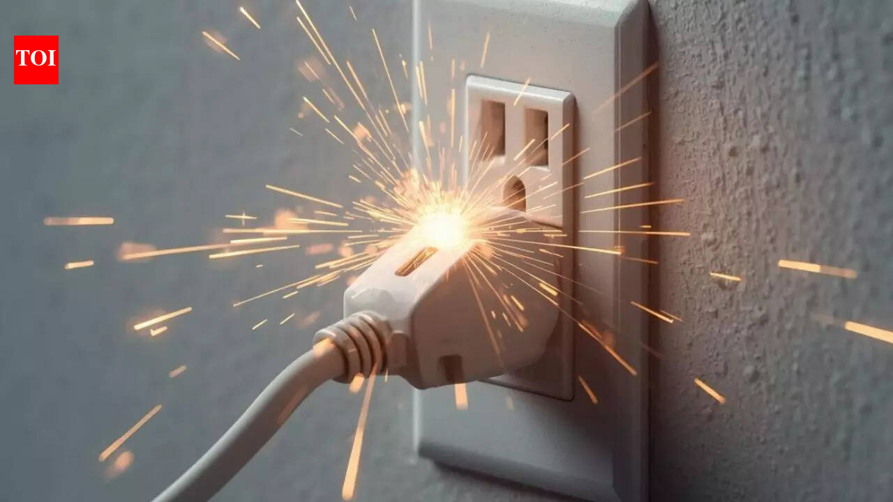 Why your power outlet spark when you plug something in and when it is dangerous