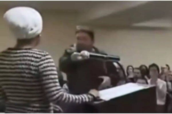 What was sprayed on Ilhan Omar during her chaotic town hall meeting?