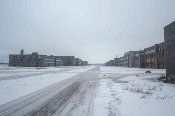 This abandoned Soviet ghost town sits frozen at the edge of the Arctic