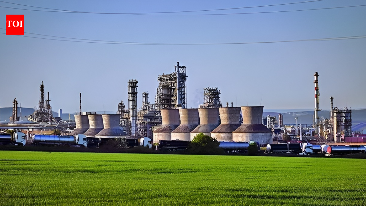 NEW DELHI: US President Donald Trump’s threat to bring back the 25% “penalty” if India does not stop buying Russian crude has deepened the question mark on the operations of Nayara refinery in Jamnagar. The crisis facing the refinery has triggered talks about change of ownership. While the refinery, under normal circumstances, would qualify to be a good buy, US’s hardline stance may prove to be a dampener for prospective buyers, something which is going to persist unless there is a dramatic breakthrough in the talks to get Russia to pause its aggression against Ukraine. Rosneft – Russia’s state-run energy giant that has been sanctioned by the Trump administration in order to pressure Vladimir Putin into agreeing to pause his offensive against Ukraine – owns majority stake in the 20 million metric tonnes per annum refinery. Located at Vadinar (Gujarat), Nayara, the country’s second-largest single-site refinery, specialises in processing heavy crude. Until the US sanctions were imposed, it was almost entirely dependent on Russian crude as feedstock. Analysts said with the immediate future of the refinery in mind, India may continue negotiating with the Trump administration to allow import of smaller volumes of Russian crude. Indian refineries have been cutting down on purchase of Russian crude. Though observers said India cannot immediately halt purchases even if it decides to reduce dependence on Urals as refiners have already booked Russian cargoes for the next eight to 10 weeks and cancelling them is not feasible, it does not remove the uncertainty about the fate of Nayara. “My sense is that India will still bargain with the US to import some amount of oil from Russia, especially for Nayara refinery,” said Prashant Vasisht, senior V-P at ratings agency ICRA. Energy expert Narendra Taneja said India will continue importing oil from Russia too, though volumes would decline. “India will continue to get oil supplies from Russia for two reasons – to assert its strategic autonomy and to maintain the right optics for domestic political consumption,” he said. “Since India has to make purchases of 0 billion from the US over a period of five years – imports of oil, gas and LPG are the best way to clock the numbers up quickly, which overall is not a bad idea since what we are going to back in return (capital, technology and bigger access to American markets) is quite attractive,” he said. India imports almost one-third of its crude from Russia, and purchases fell to .7 billion in Dec 2025 – the lowest monthly value of shipments in the last three years – and nearly 27% lower than the .7 billion recorded in Nov, according to commerce department data. Despite the decline, Russia remained the largest crude supplier to India in 2025-26, accounting for 31.5% of purchases worth 5.1 billion during April-Dec.End of ArticleFollow Us On Social MediaVideos‘Few Political Elements Trying To Distort’: Goyal Explains India-US Trade Deal, Slams Opposition‘India Has A Preference Over…’: Piyush Goyal On US Trade Deal, Trump’s ‘Russian Oil’ Claim‘Embarrassed Himself’: Gaurav Gogoi Slams Assam CM Himanta Sarma Over ‘Pakistan Links’ Allegation‘1.25 Crore Hindus In Bangladesh’: RSS Chief Mohan Bhagwat Issues Big Unity CallUkraine to Gaza: Malaysia PM Anwar Ibrahim hails PM Modi’s unwavering global peace pushGogoi’s wife Elizabeth worked for Pakistani agent Ali Tauqeer Sheikh: Assam CM Himanta Biswa Sarma‘India’s Stand on Terrorism Is Clear’: PM Modi Speaks Firmly During Malaysia Visit”Strategic Ties And Trade Strengthened”: PM Modi Exchanges MoUs With Malaysian PM’Reasons For Reducing Russian Oil Imports Are…’ Foreign Expert Explains India-US Trade FrameworkIndia Reiterates Energy Security Priority, Signals Russia Oil Imports Will Continue123Photostories5 Vastu-approved plants you should bring home today for prosperity5 effective ways to keep spiders away from your home and garden (third is a magical remedy!)Top 6 cheapest destinations to travel in India in 20268 types of kadhi from across India to try for lunchScarlett Johansson net worth: Inside the USD 165 million fortune of Marvel’s ‘Black Widow’ starFrom Bad Bunny, Green Day to Charlie Puth: Full list of Super Bowl 60 performersFrom a massive living room to lavish bedrooms: A look at Samay Raina’s luxurious housePM Narendra Modi’s Panch Prana goal and the role of Shatavari and it’s importance in traditional Indian kitchens7 warning signs of structural defects every homeowner should know‘The Fame Game’, ‘Mrs. Deshpande’, ‘Maa Behen’: Madhuri Dixit Nene’s evolving OTT journey123Hot PicksBudget 2026Gold Silver PricesParliament Budget SessionGCC Unified Visa 2026Income Tax CalculatorPublic holidays February 2026Bank Holidays februaryTop TrendingFortnite Love EventBoston Celtics vs New York KnicksLindsey Vonn InjurySuper Bowl LX TicketSuper Bowl PredictionsJustin GaethjeLIV GolfLiam Paro vs Paddy Donovan Net WorthWinter Olympics 2026NBA Trade Update
