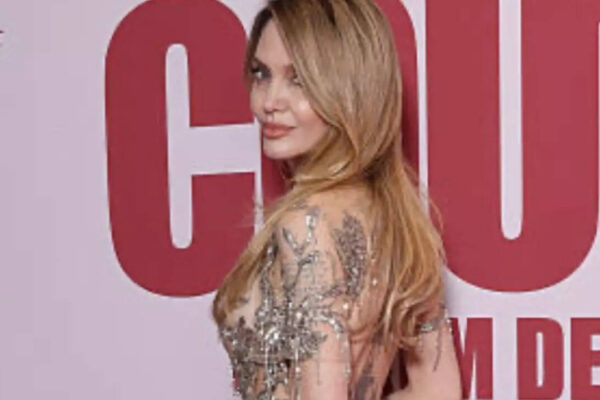 Angelina Jolie stuns in sheer dress at ‘Couture’ Paris premiere – WATCH
