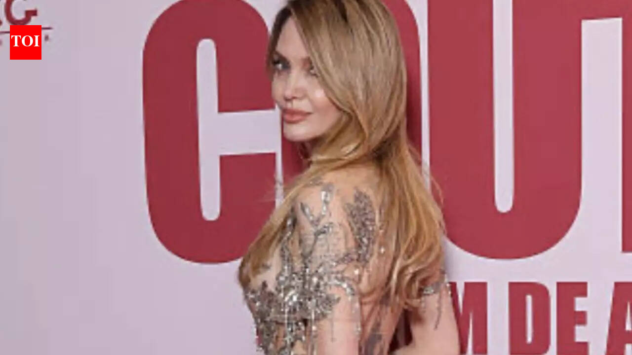 Angelina Jolie stuns in sheer dress at ‘Couture’ Paris premiere – WATCH