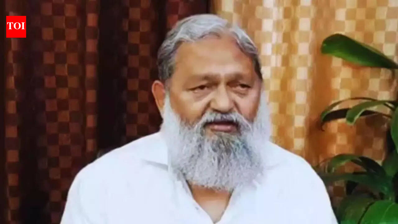 Anil Vij  NEW DELHI: A heated exchange broke out between Haryana minister Anil Vij and Kaithal Superintendent of Police Upasna during a district grievance redressal meeting on Friday after the officer declined to suspend a policeman in a land-related case, saying she did not have the authority to do so.The incident occurred in Kaithal where Vij, who holds the energy, transport and labour portfolios, was chairing the meeting. A local resident had levelled allegations against an assistant sub-inspector (ASI) in connection with a land sale matter that is currently under investigation.During the proceedings, Vij directed that the ASI be suspended. “I am ordering that till action is taken in the matter, he (the ASI) should be suspended because he can use his influence (in the case),” the minister said.SP Upasna responded that the officer in question belonged to a neighbouring district and was not under her administrative control. “I don’t have the power to suspend him. The suspension order in this case can be issued by the Kurukshetra SP,” she said.Vij insisted that she act on his direction. “I am giving orders to suspend him (the ASI),” he told her, asking her to write to the Director General of Police (DGP) for necessary action.The SP maintained her position. “I can write this… But I cannot suspend (the ASI),” she said.As the exchange grew tense, Vij remarked, “In every work, you do like this. I am ordering you that he should be suspended. You write to the DGP… I am telling you, you only have to execute my order.”He added, “‘Mera order sare Haryana mein chalta hai’ (my order is applicable in entire Haryana),” drawing applause from some people present at the meeting, according to a video of the incident.The complainant, who was attending the session, also intervened, saying, “Madam, every time you do like this.”Sensing the situation escalating, Kaithal deputy commissioner Aparajita told the minister that the SP had agreed to write to the DGP. Vij responded, “You write to the DGP that he (the ASI) should be suspended… I will see who doesn’t listen (to the order),” pointing towards the SP.This is not the first time a disagreement has surfaced between Vij and senior police officials during grievance meetings. Three months ago, he had a similar altercation in Kaithal, alleging that a police officer ignored his directive to register a Zero FIR in a fraud case. More than a decade ago, Vij had also stormed out of a grievance meeting after a heated exchange with a woman IPS officer.About the AuthorTOI News DeskThe TOI News Desk comprises a dedicated and tireless team of journalists who operate around the clock to deliver the most current and comprehensive news and updates to the readers of The Times of India worldwide. With an unwavering commitment to excellence in journalism, our team is at the forefront of gathering, verifying, and presenting breaking news, in-depth analysis, and insightful reports on a wide range of topics. The TOI News Desk is your trusted source for staying informed and connected to the ever-evolving global landscape, ensuring that our readers are equipped with the latest developments that matter most.”Read MoreEnd of ArticleFollow Us On Social MediaVideosBNP Demands Sheikh Hasina’s Extradition From India After Bangladesh Poll WinCongress Demands Union Minister Hardeep Puri Resignation Over Alleged Jeffrey Epstein Links RowPM Modi Speaks To BNP Chief Tarique Rahman, Congratulates On ‘Remarkable’ Bangladesh Poll Win6-Year-Old Dead, 5 Injured As Speeding Car Hits Pedestrians On Busy Lucknow Road; CCTV Shows HorrorKiren Rijiju Explains Why Modi Govt Paused Privilege Notice Against Rahul Gandhi After Dubey’s MoveTarique Rahman’s BNP Heads For Landslide In Bangladesh Election, Rivals Cry FoulPM Modi Unveils Seva Teerth, A New PMO Hub Marking Governance Shift In National Capital DelhiRafale To Be Built In India For The First Time Outside France After DAC Nod For 114 Fighter Jets’Bangladesh Rejected Pakistan-Backed Jamaat’: Experts Decode BNP’s Historic Return To PowerCDS General Anil Chauhan Links History With Border Disputes With China, Recalls Nehru Knew About It123PhotostoriesTop 5 real estate hotspots in Noida to watch in 2026Seva Teerth opens doors: PM Modi launches new PMO complex in New Delhi – see picsAbs don’t equal healthy arteries: Doctor explains why appearance isn’t a health report card5 key features that make adventure bikes perfect for long-distance touring5 ways to remove pesticides from grapes and strawberries, tips for storage, and easy dishesFrom built-in air conditioners to radar ears: 5 animals with the weirdest ears and how they use themPersonality test: The rose you choose reveals how you deal with stressValentine’s Day 2026: 7 romantic red cocktails for Valentine’s Day celebrationFrom Titan Arum to Bulbophyllum Phalaenopsis: 7 worst smelling flowers of the worldDid you know Shahid Kapoor was rejected 100 times before his debut in ‘Ishq Vishk’? 6 lesser-known facts about ‘O Romeo’ actor123Hot PicksIT Stocks CrashGold Silver PricesBangladesh Election ResultsTelangana Municipal Elections ResultsIncome Tax CalculatorPublic holidays February 2026Bank Holidays februaryTop TrendingMarvel Rivals Season 6.5 Release dateErika KirkBad BunnyCatherine Polli Net WorthSeahawks Super Bowl paradeKayla NicoleAnthony JoshuaChloe KimCardi BMax Muncy